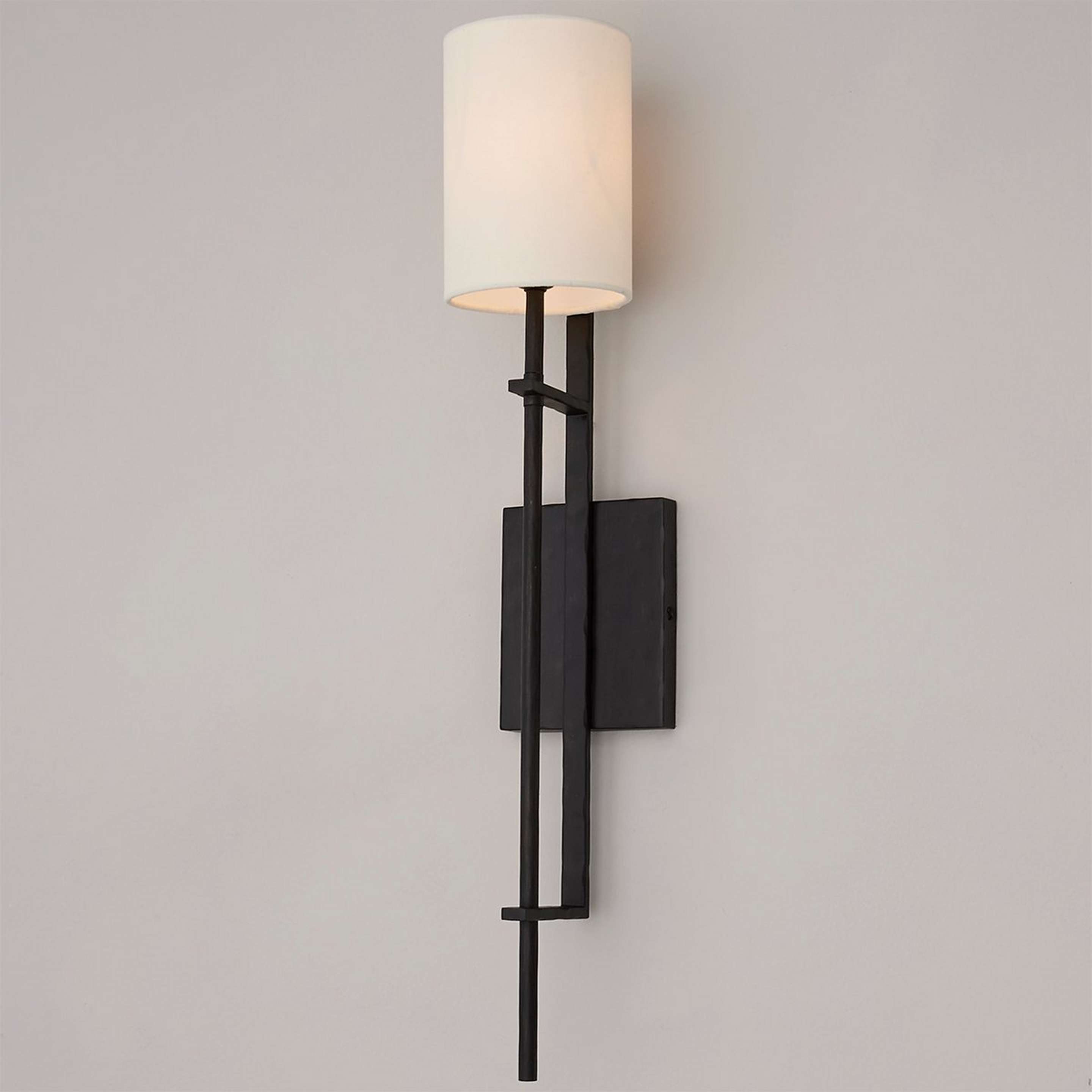 A Sierra Peak Sconce with Aged Iron color