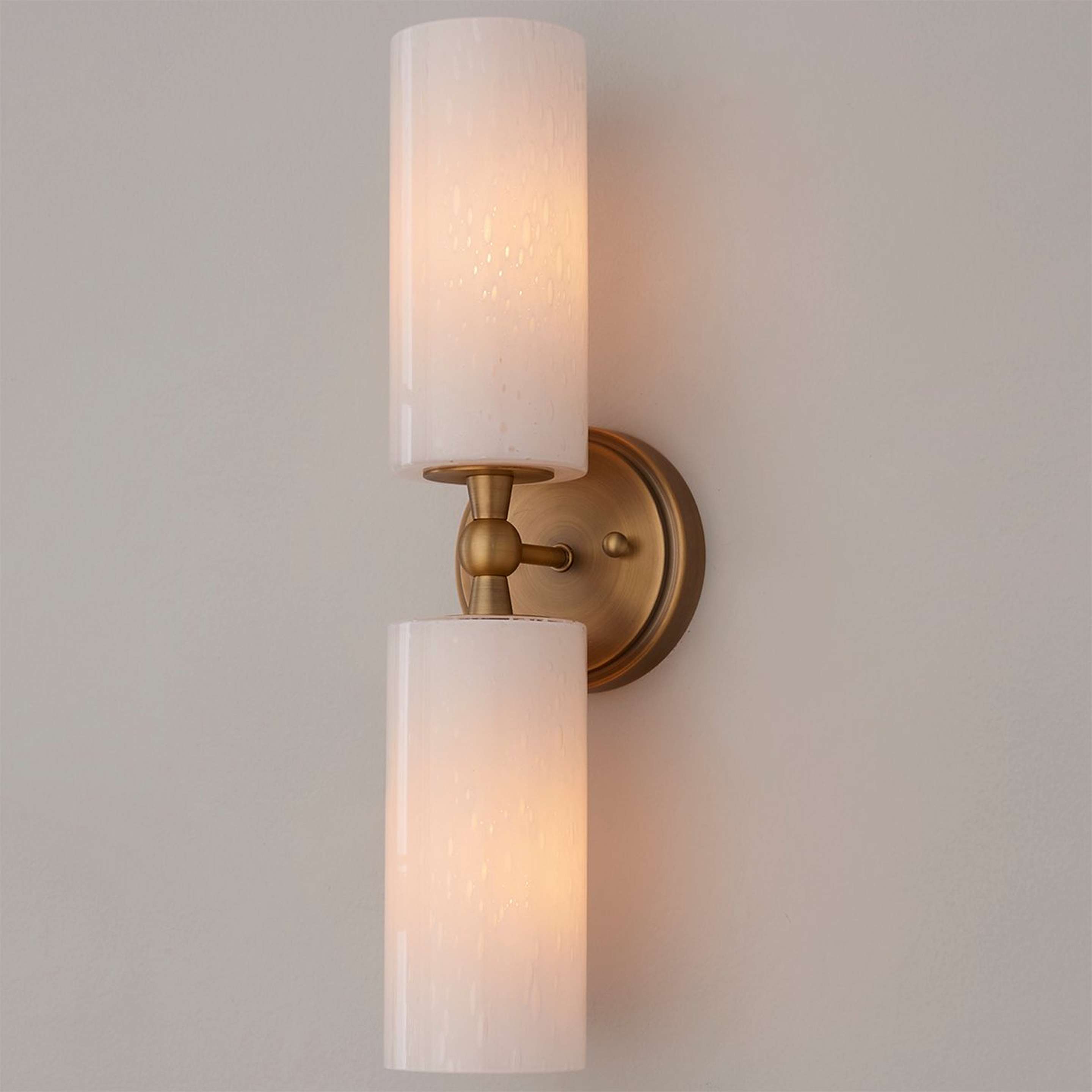 A Thayer Sconce with Brass / Opaque Seeded Glass color