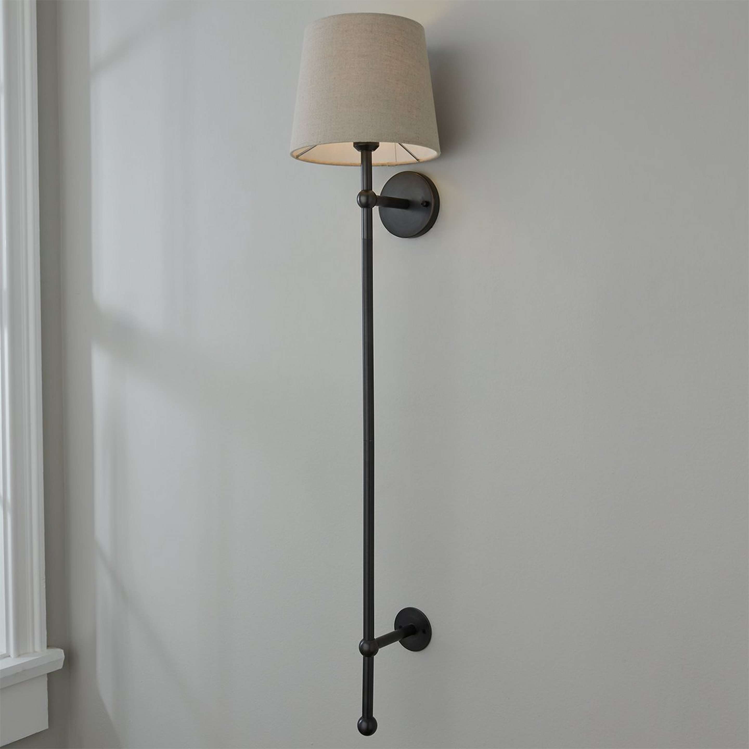 A Lester Oversized Sconce with Oil Rubbed Bronze color