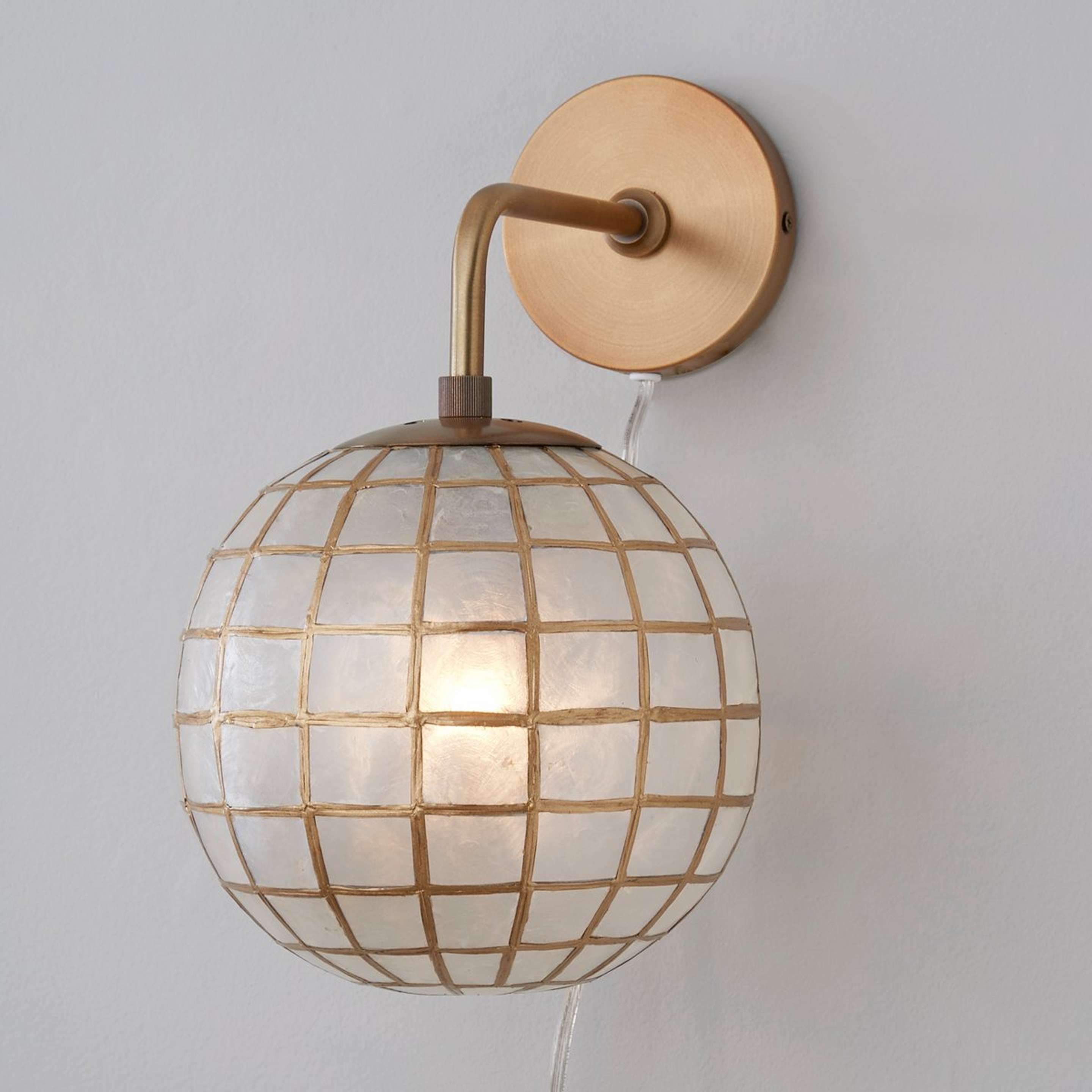 A Arista Sconce with Brass / Capiz color