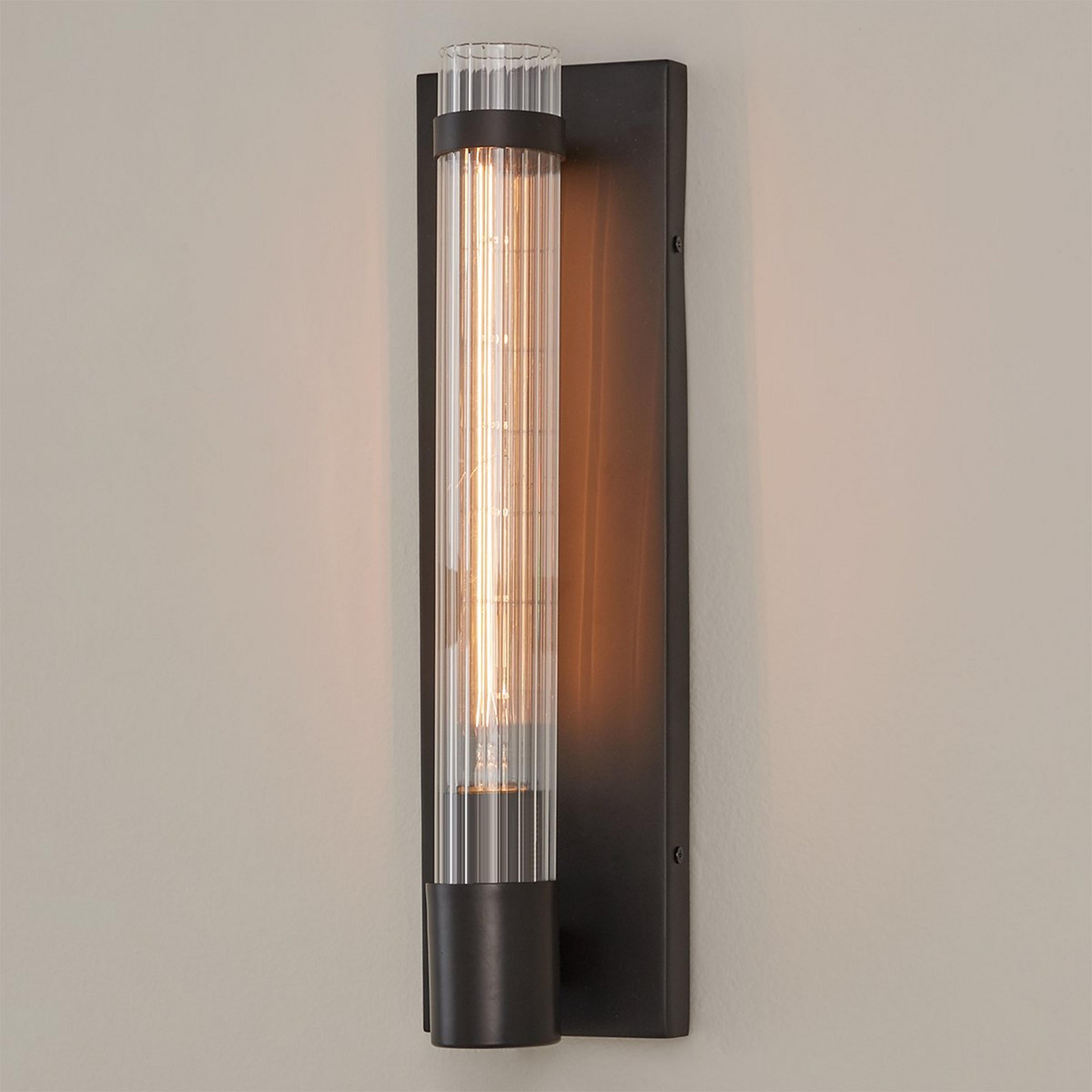 A Fluted Cylinder Glass Sconce with Black color