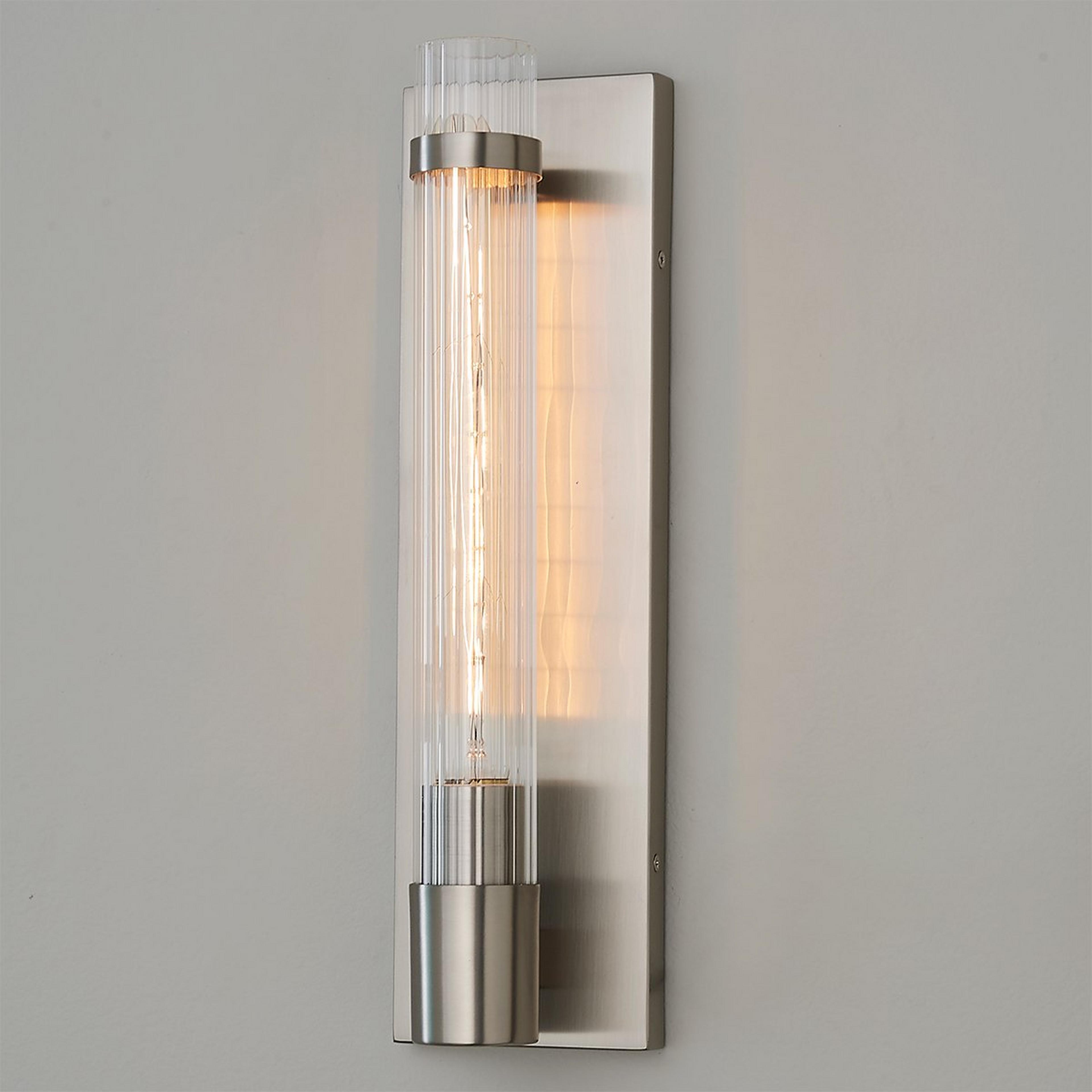A Fluted Cylinder Glass Sconce with Satin Nickel color