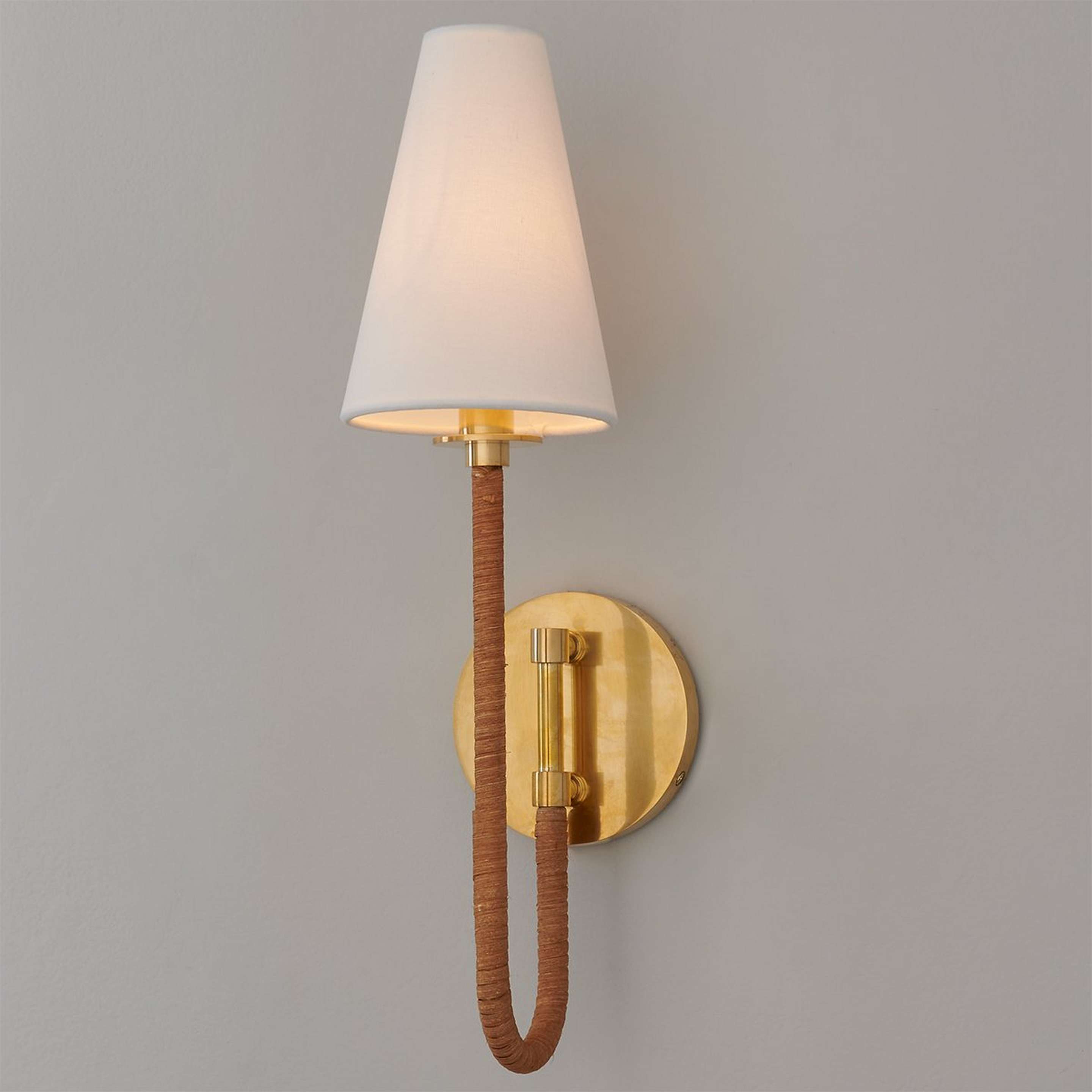 A Rattan Swoop Sconce with Aged Brass / Rattan color