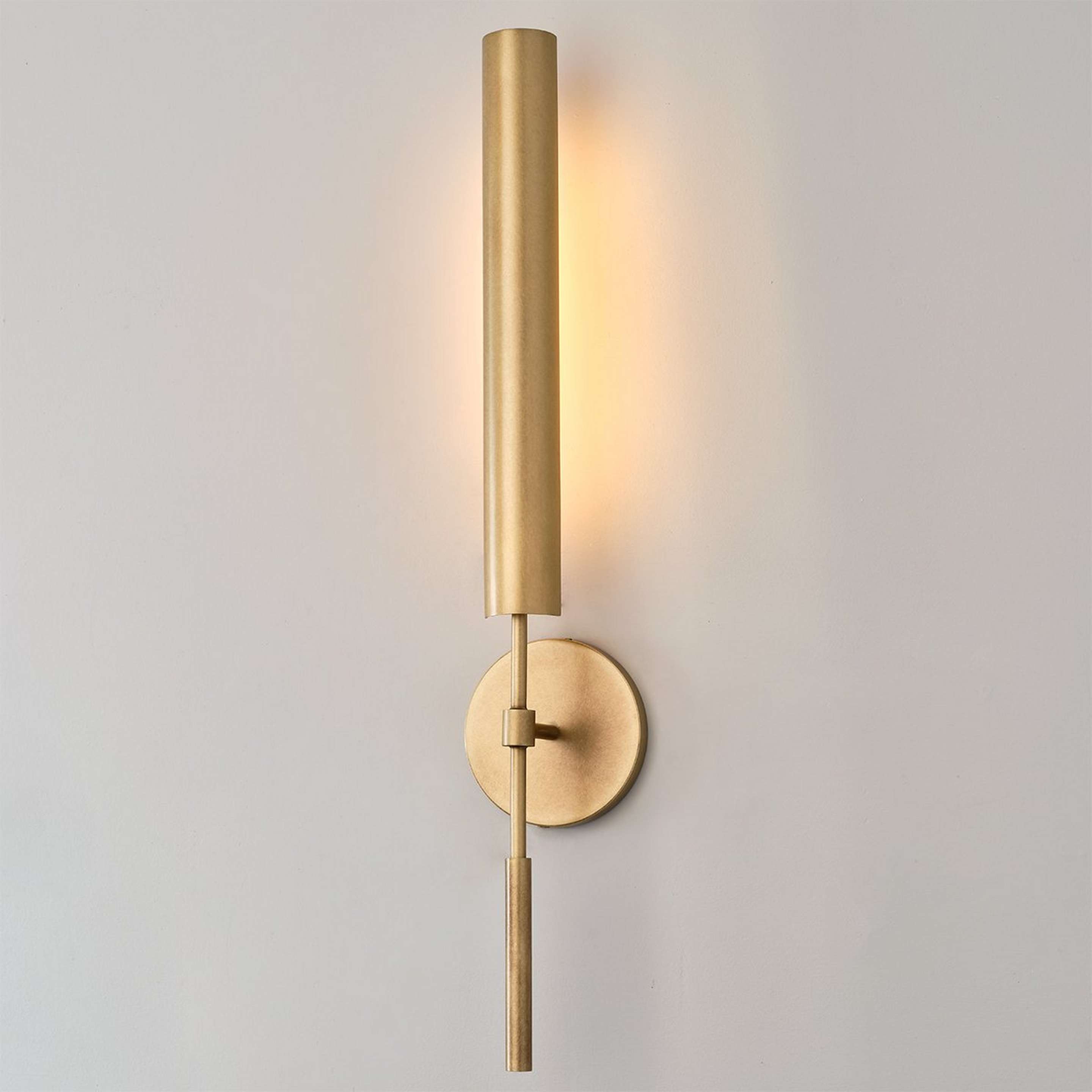 A Deidra LED Sconce with Aged Brass color