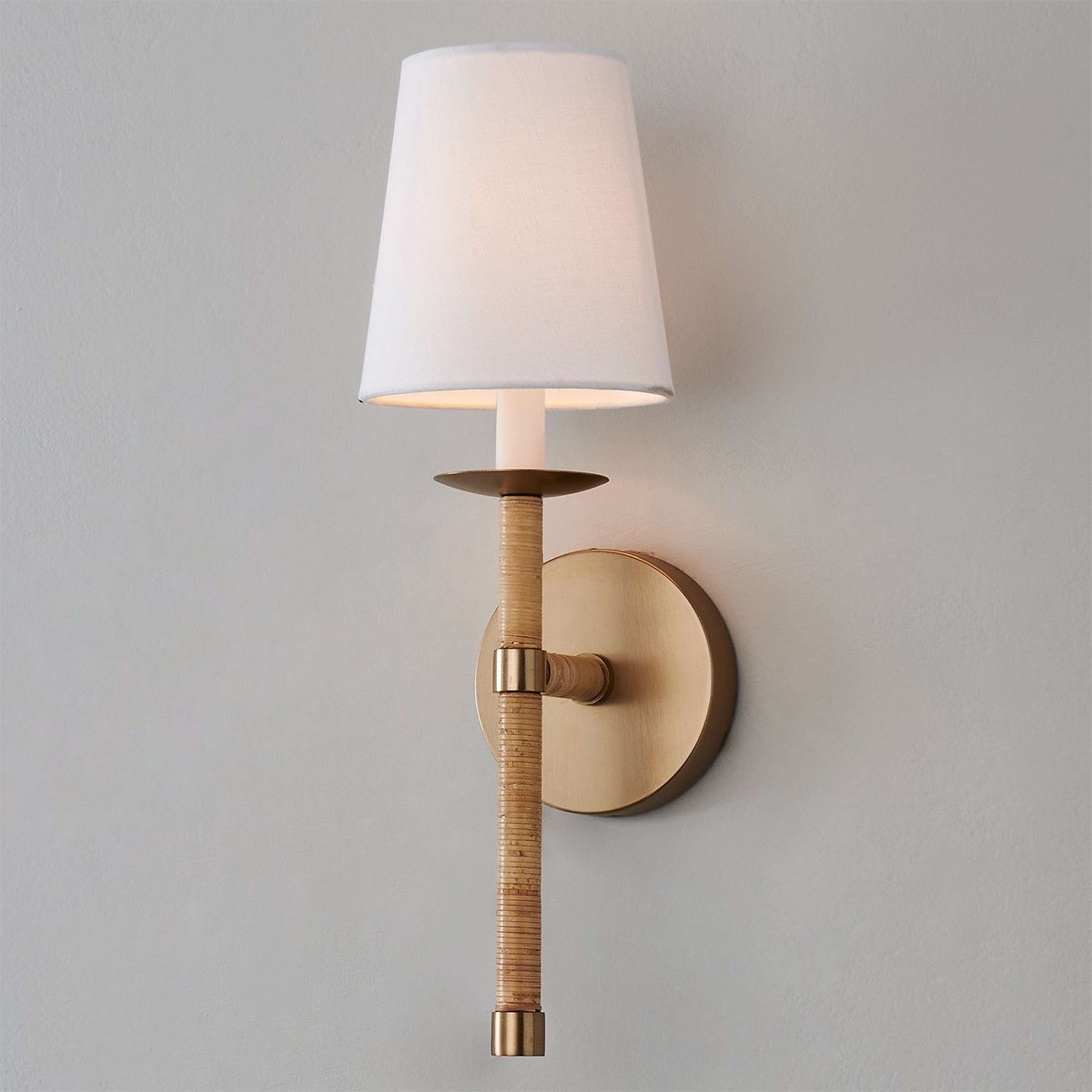 A Demske Sconce with Matte Brass / Rattan color