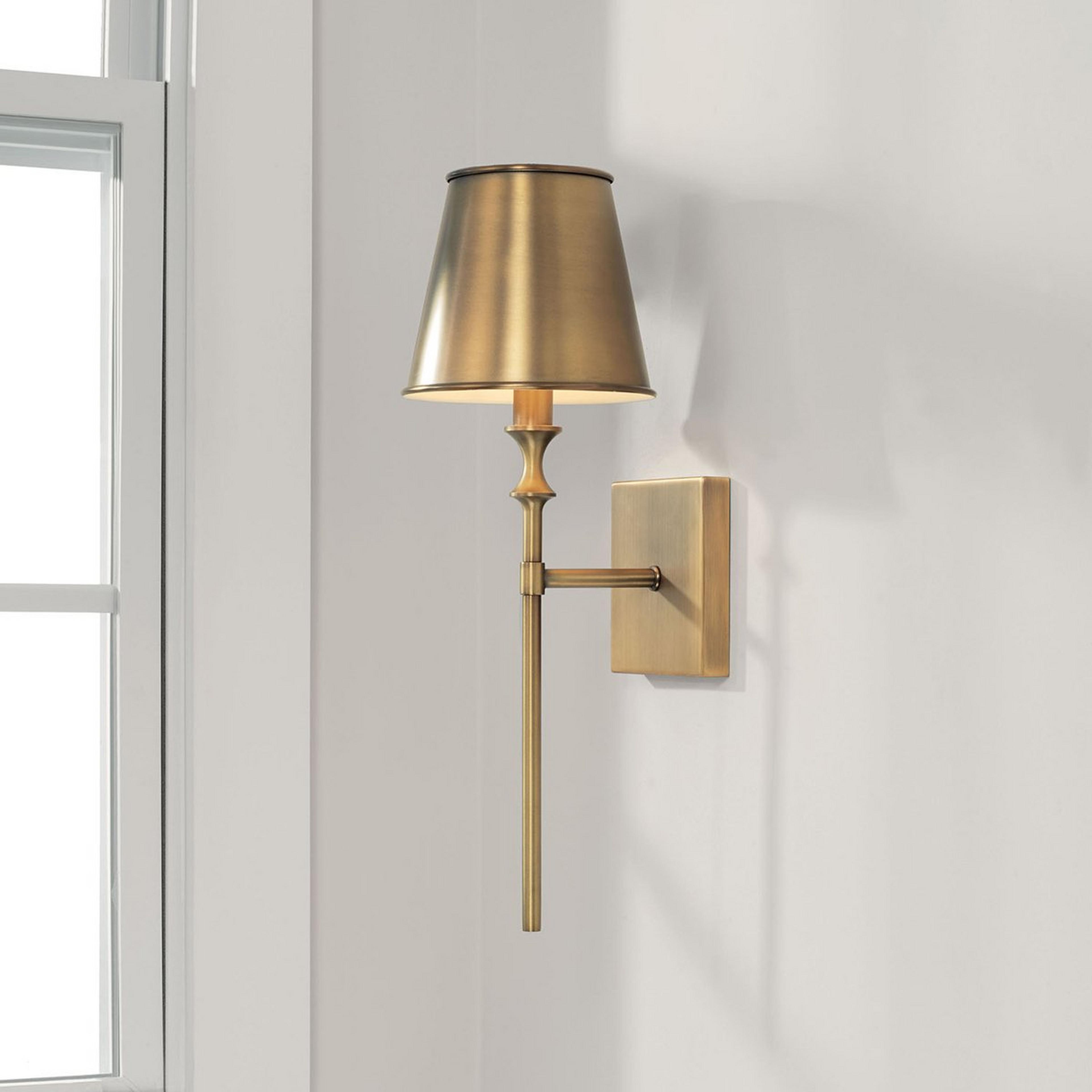 A Antigue Single Sconce with Aged Brass  color