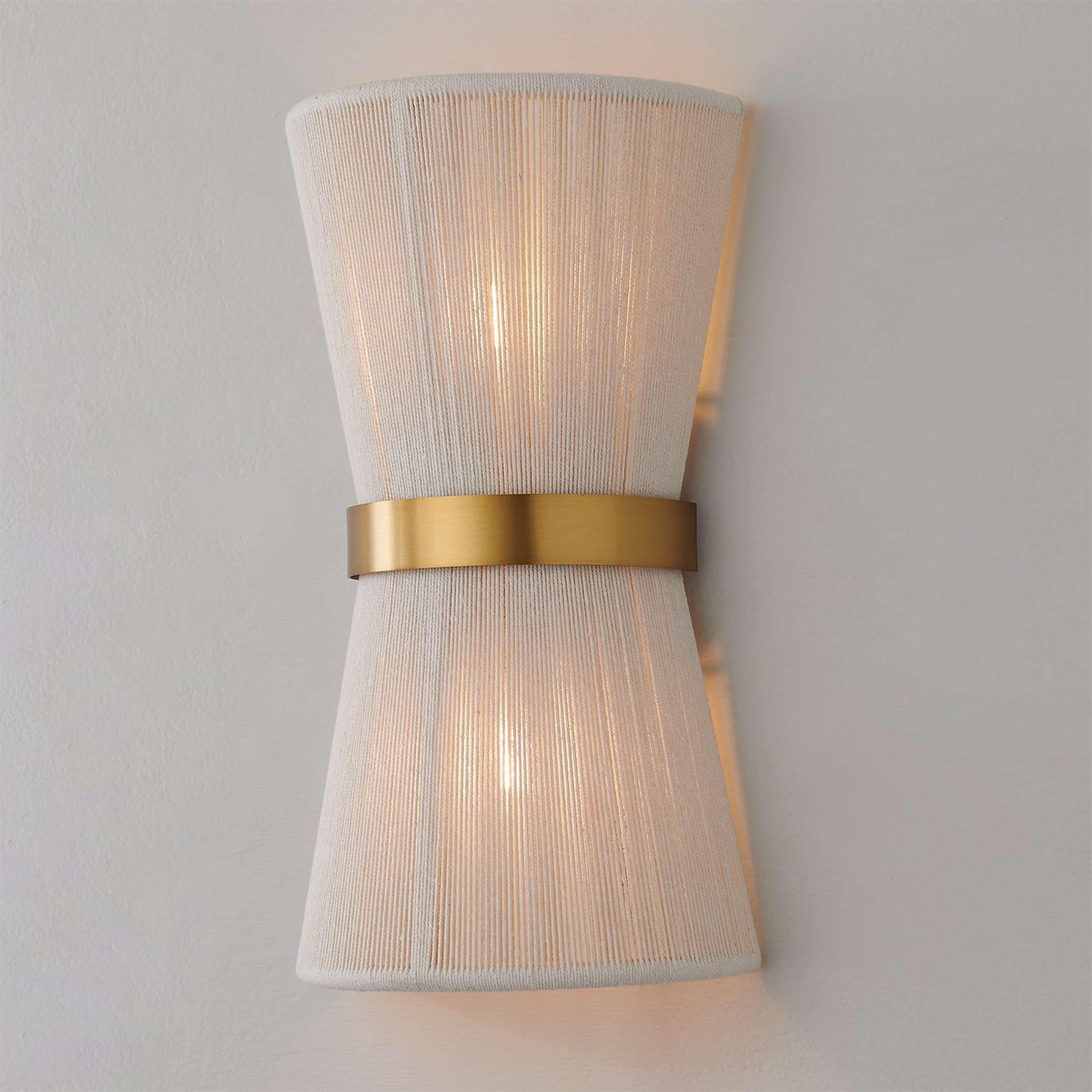 A Halia Sconce with Brass / Natural Ivory color