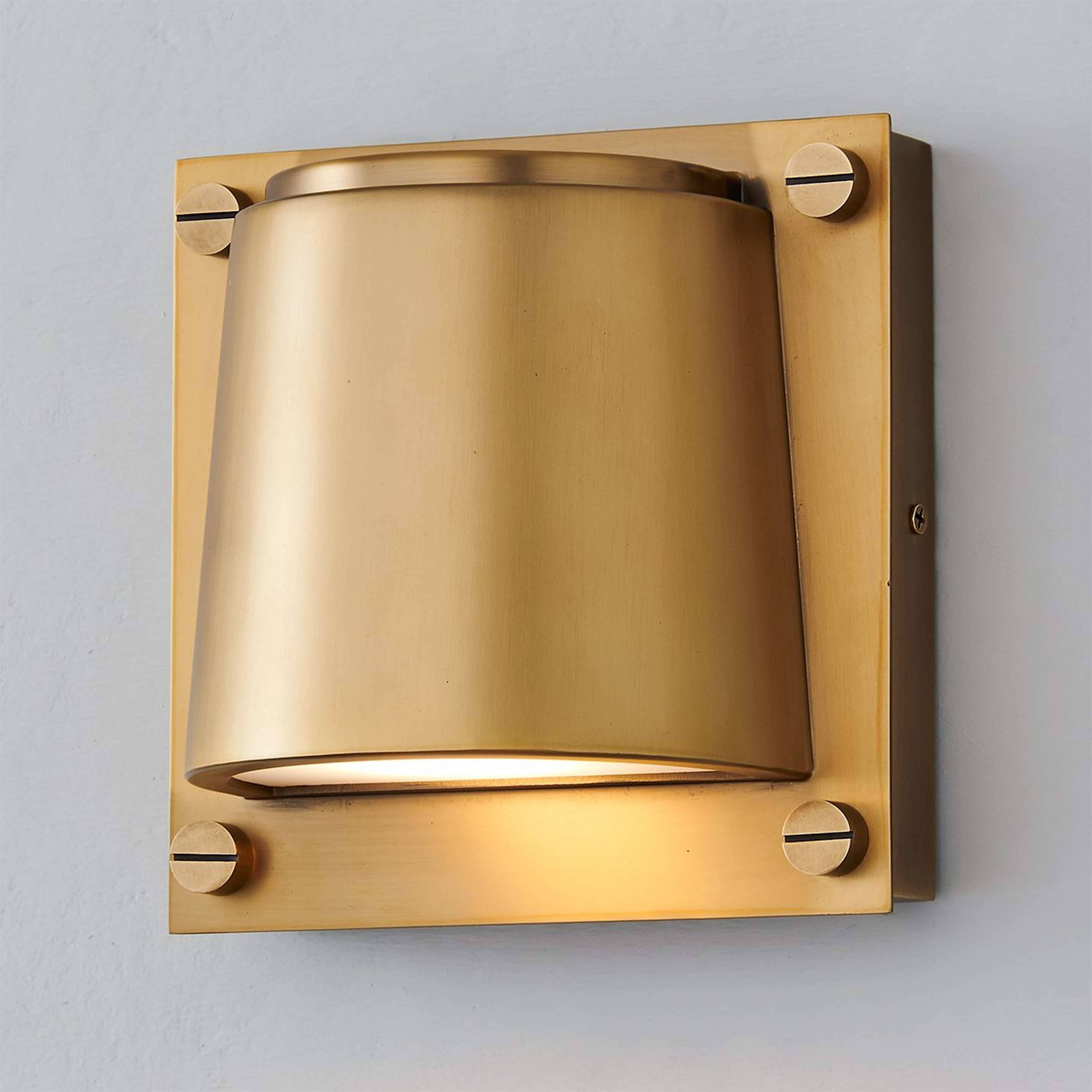 A Seymour Sconce with Aged Brass color