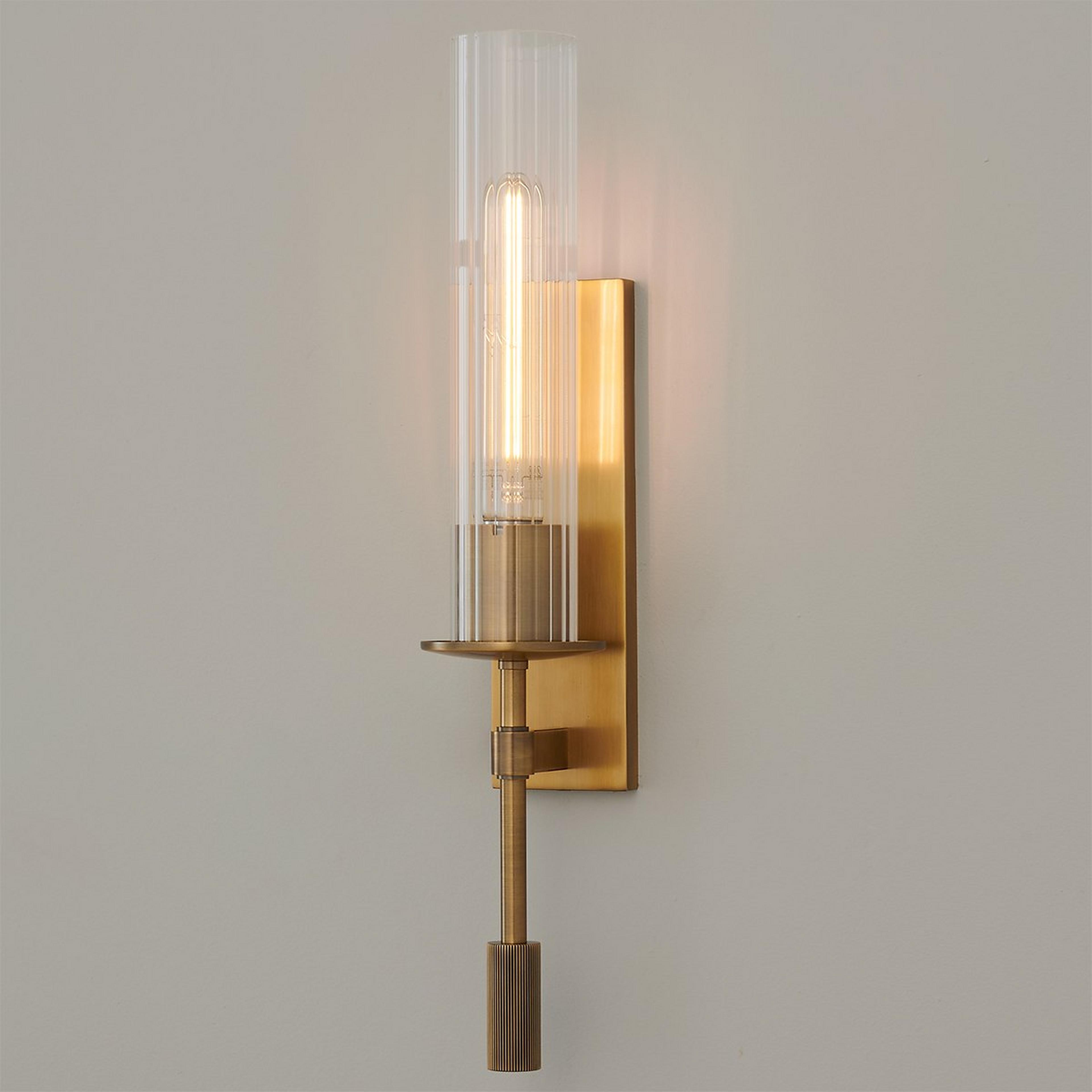 A Wakefield Sconce with Brass / Clear Fluted Glass color