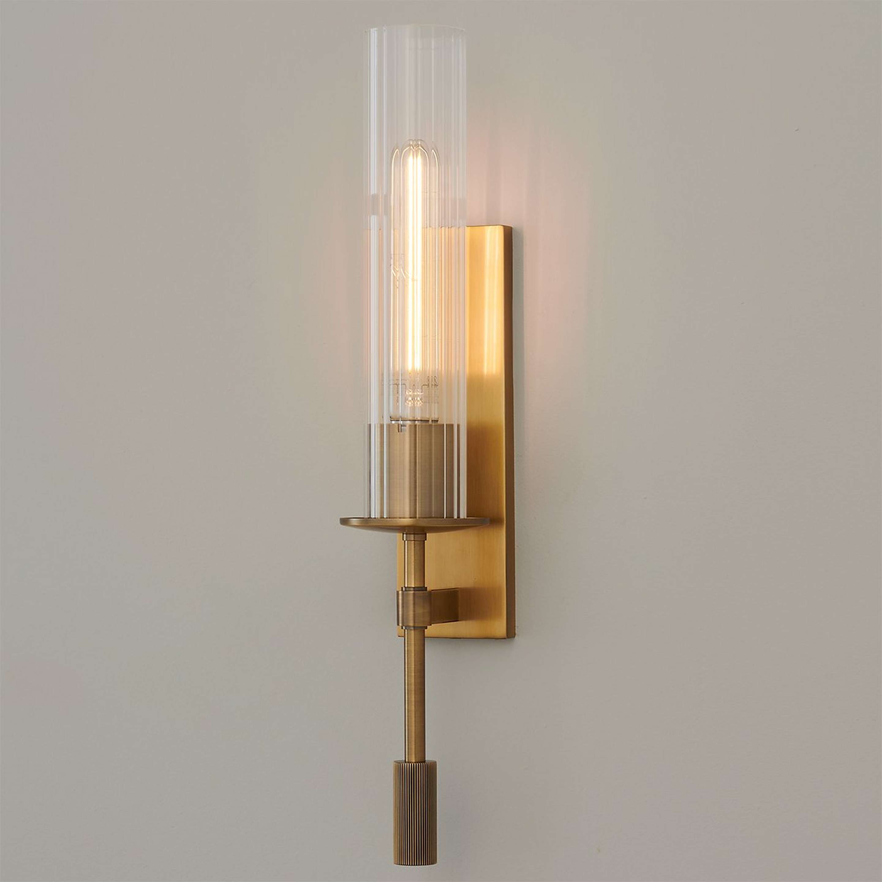 A Wakefield Sconce with Brass / Clear Fluted Glass color