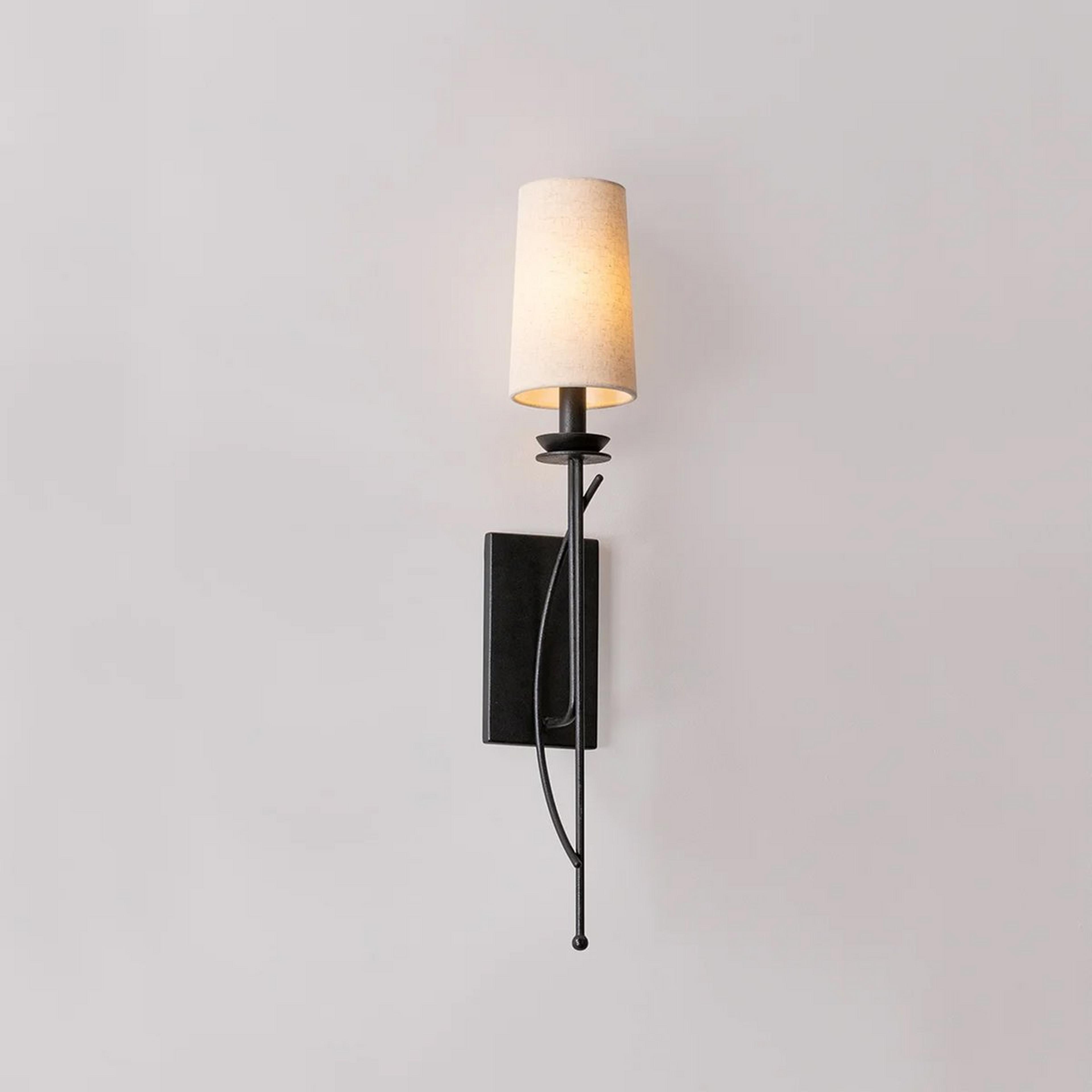 A Ortiz Sconce with Iron / Tan color