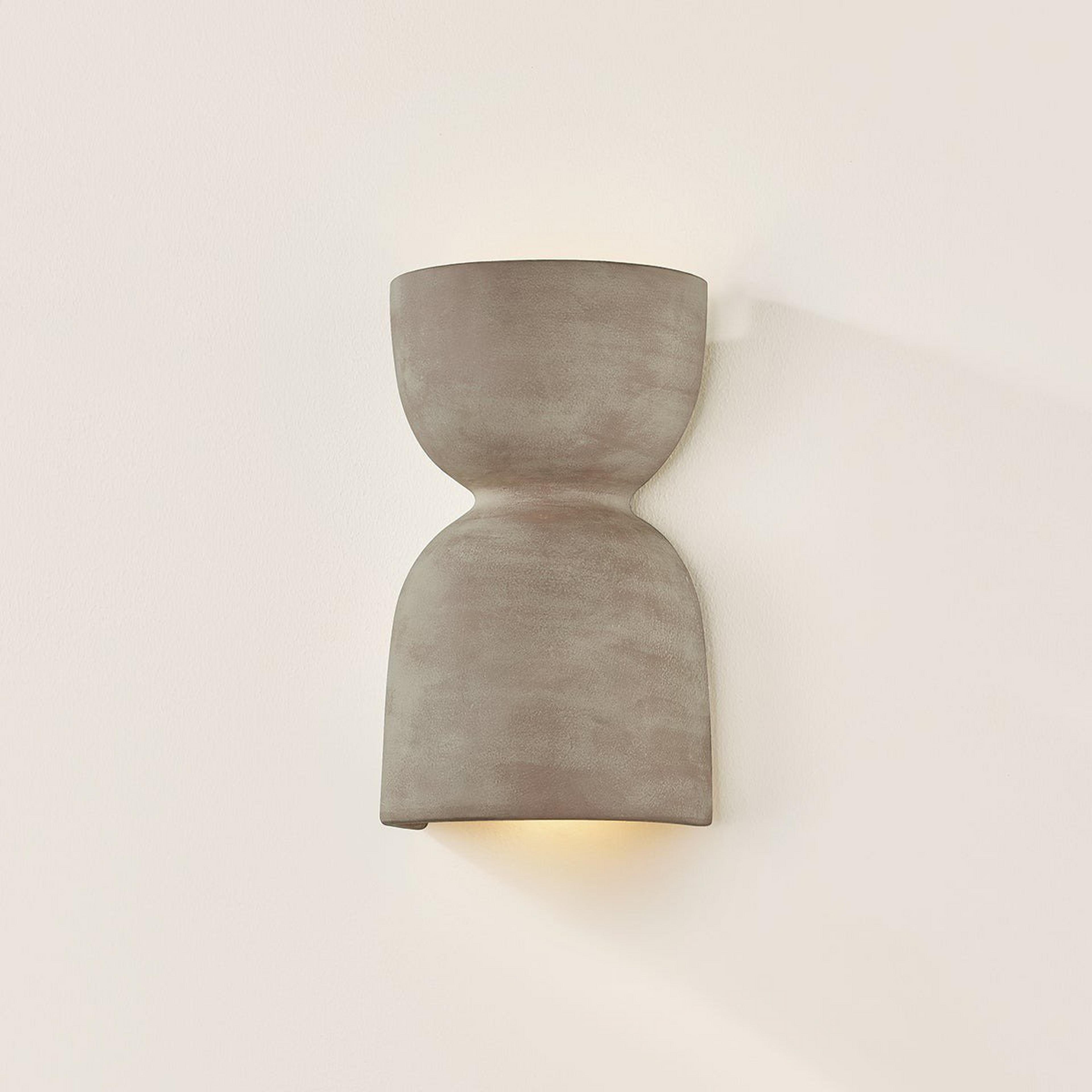 A Stonebrush Sconce with Brass / Neutral Ceramic color