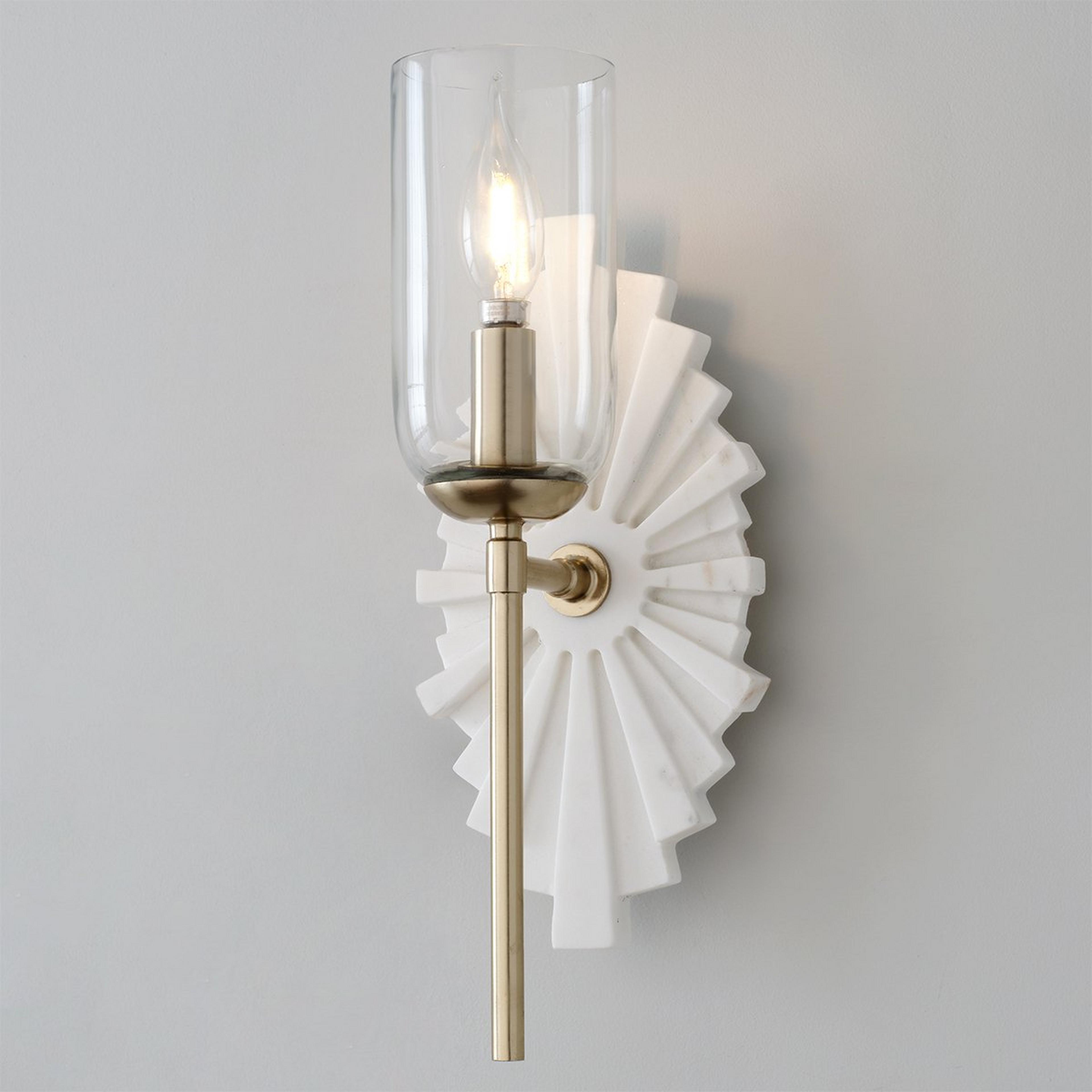 A Radiant Ra Wall Sconce with Brass / White Marble / Clear Glass color