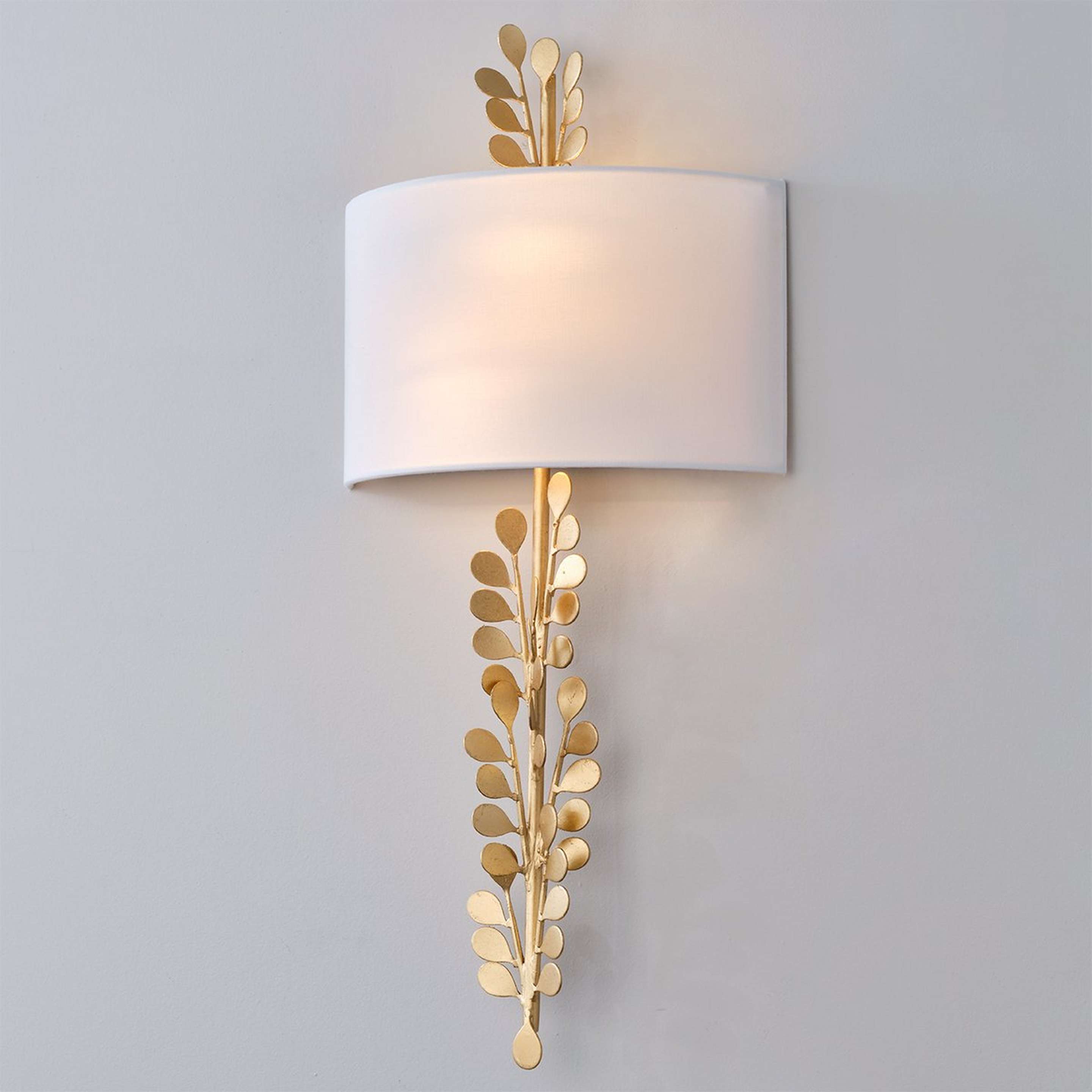 A Hiedra Sconce with Gold color
