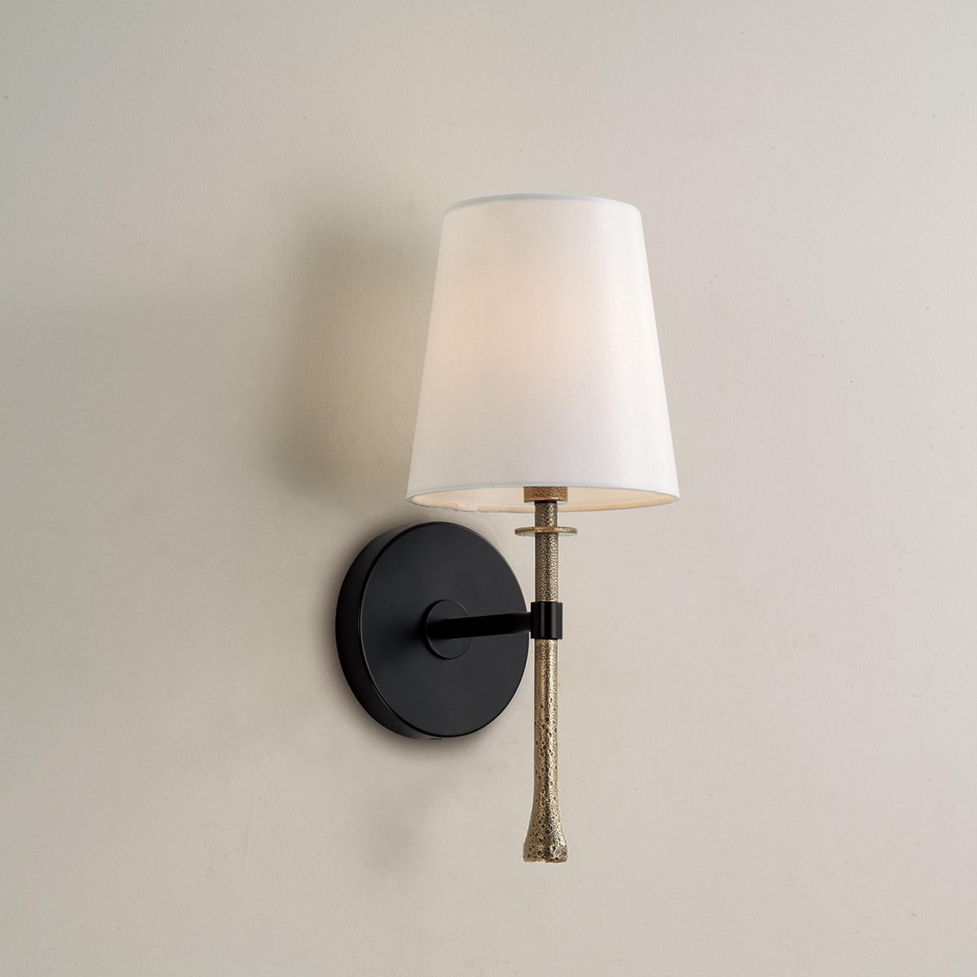 A Iyad Sconce with Matte Black / Hammered Gold color