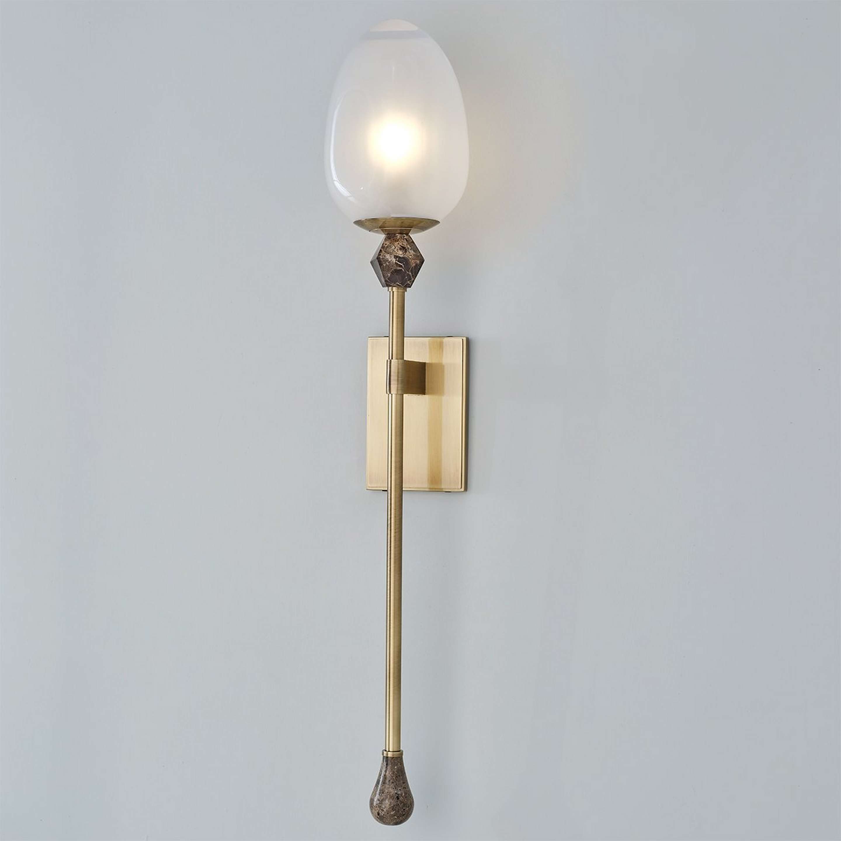 A Sugarloaf Sconce with Vintage Brass color