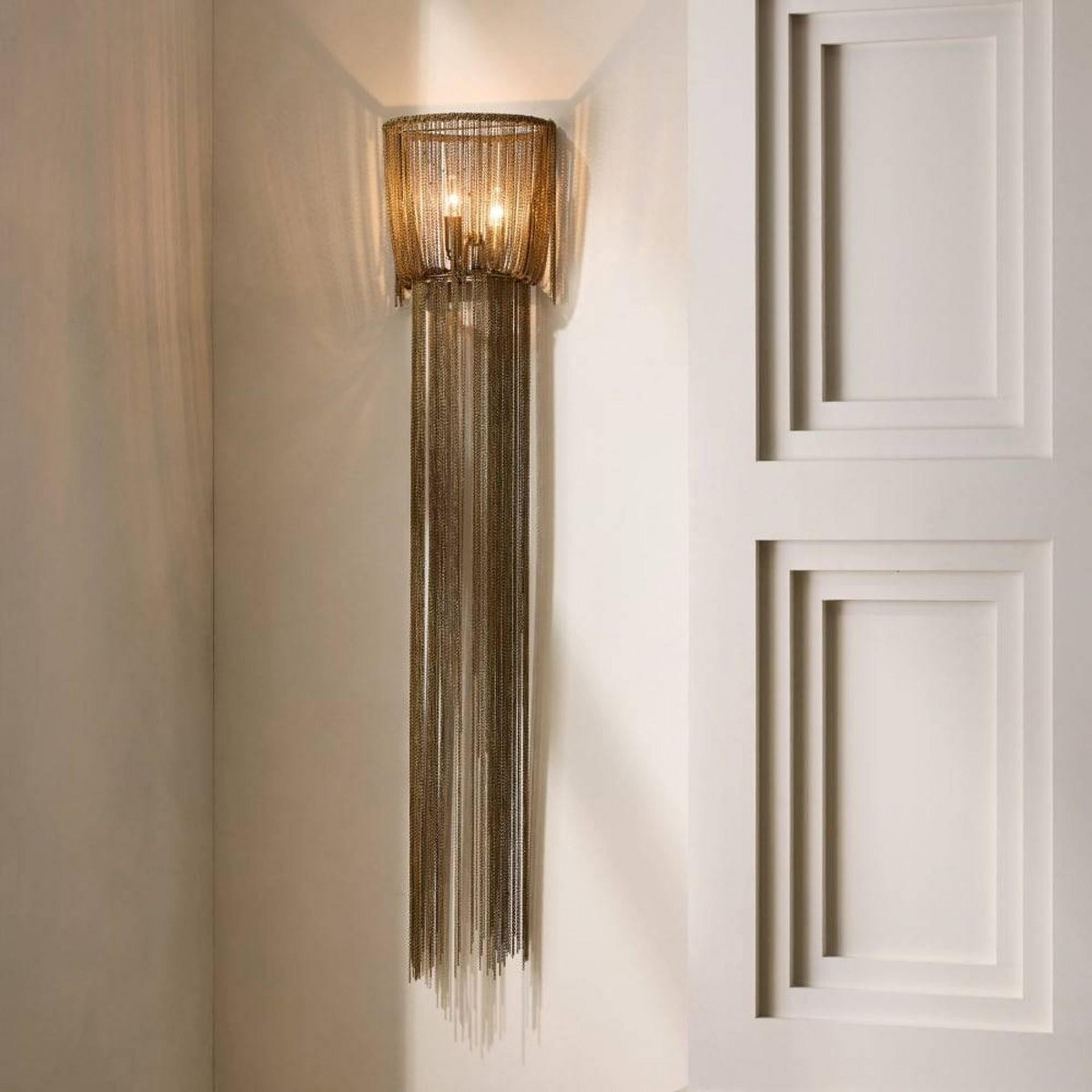 A Cascaded Chain Sconce with Aged Brass color
