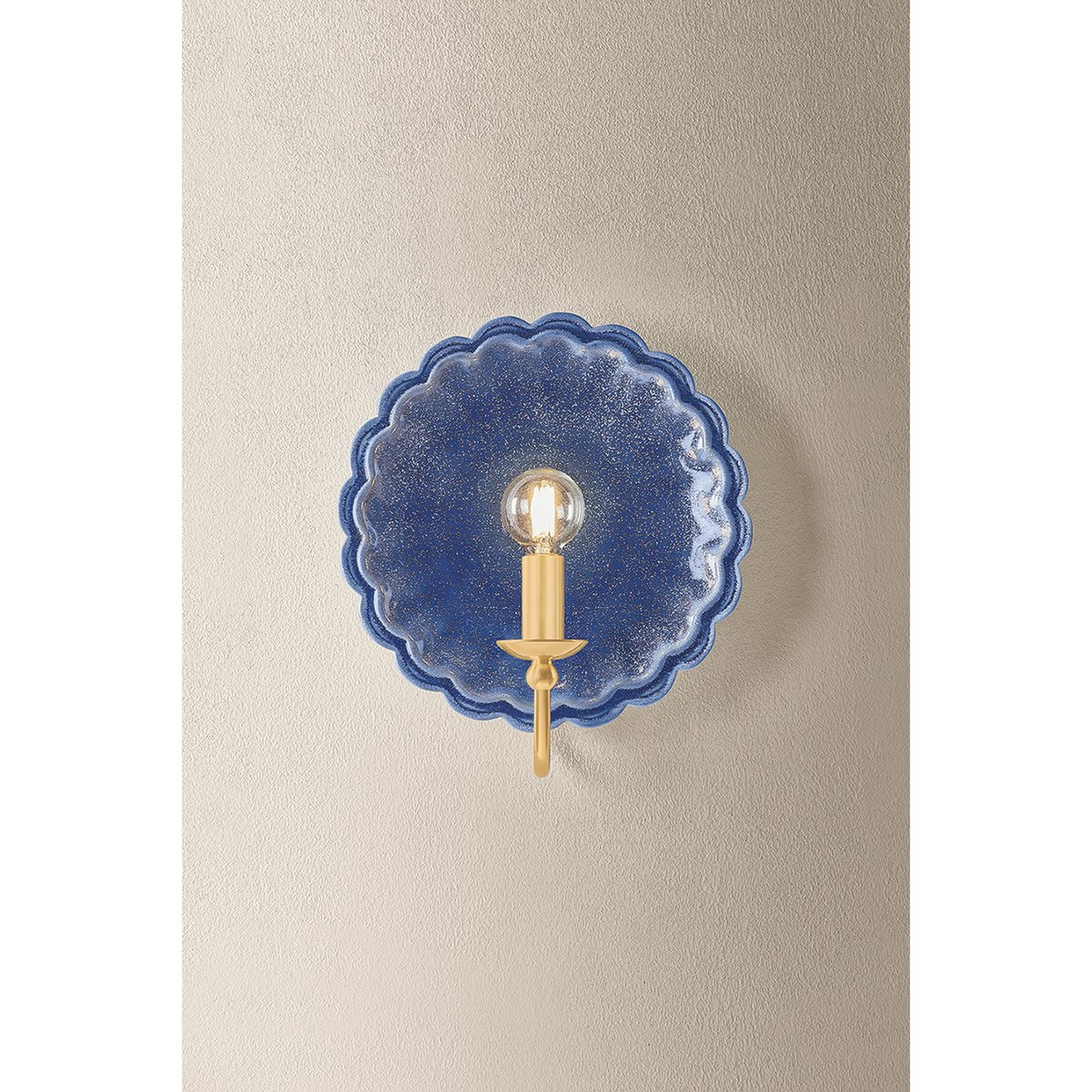 A Jen Sconce with Indigo / Aged Brass color