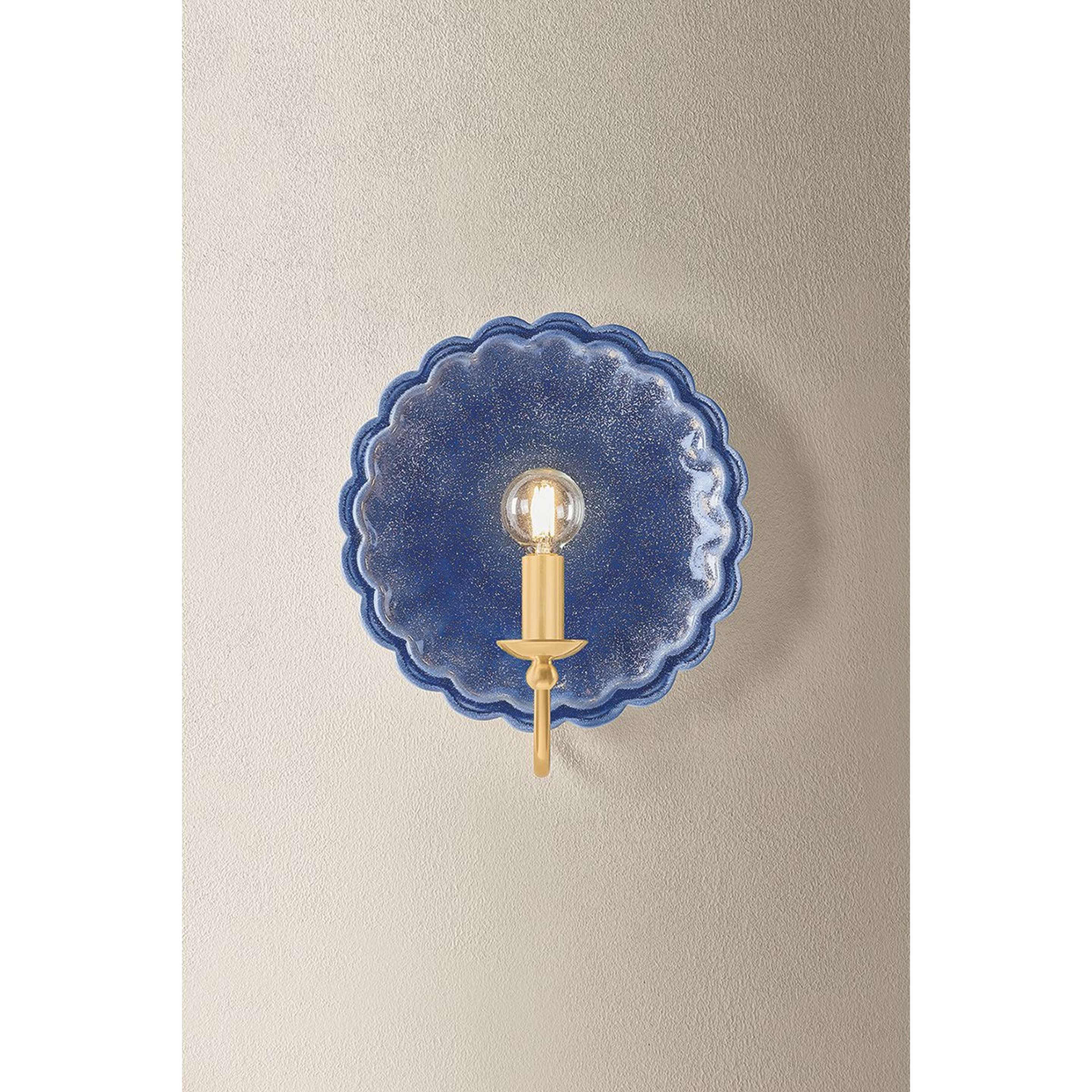 A Jen Sconce with Indigo / Aged Brass color