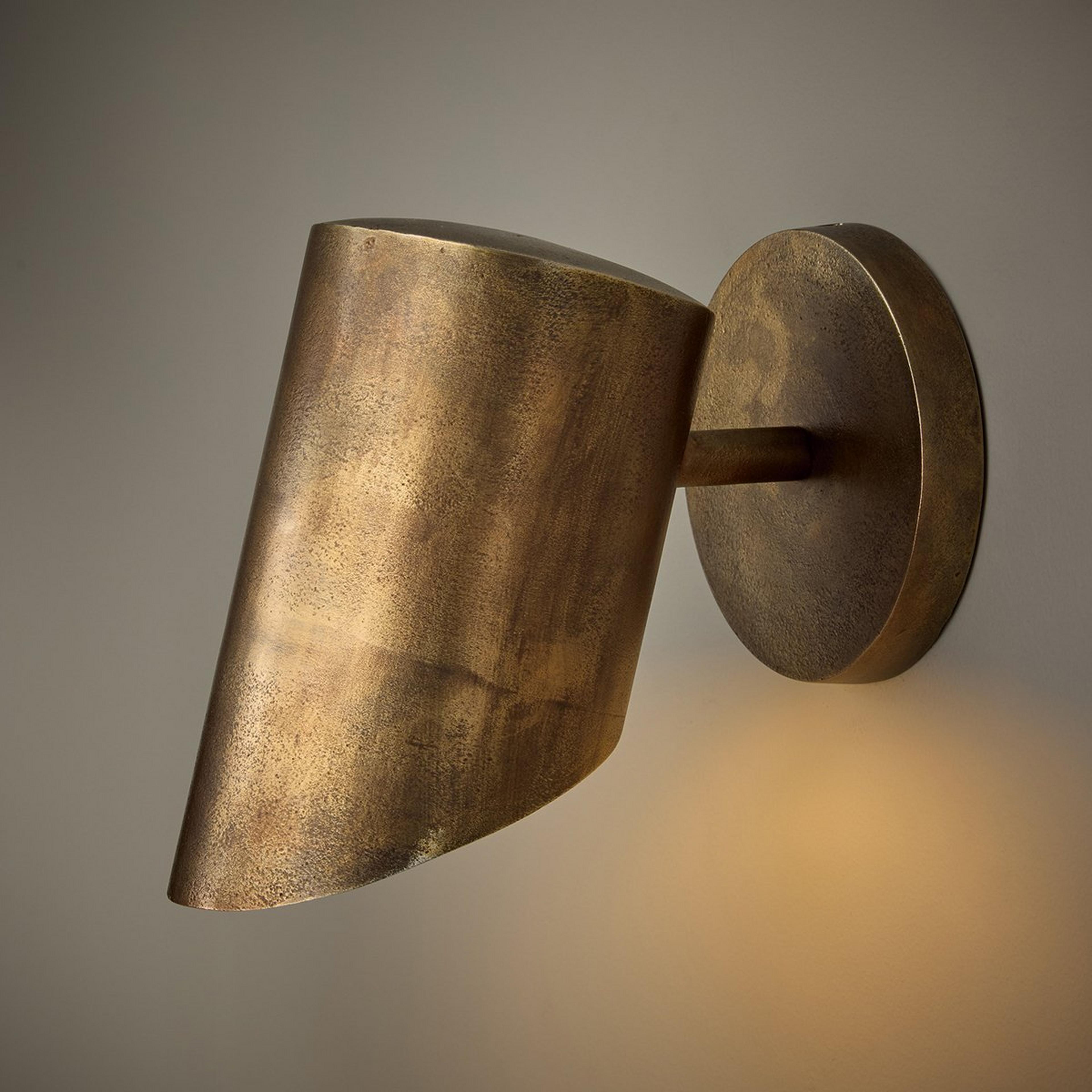 A Sutton Cylinder Sconce with Aged Brass color