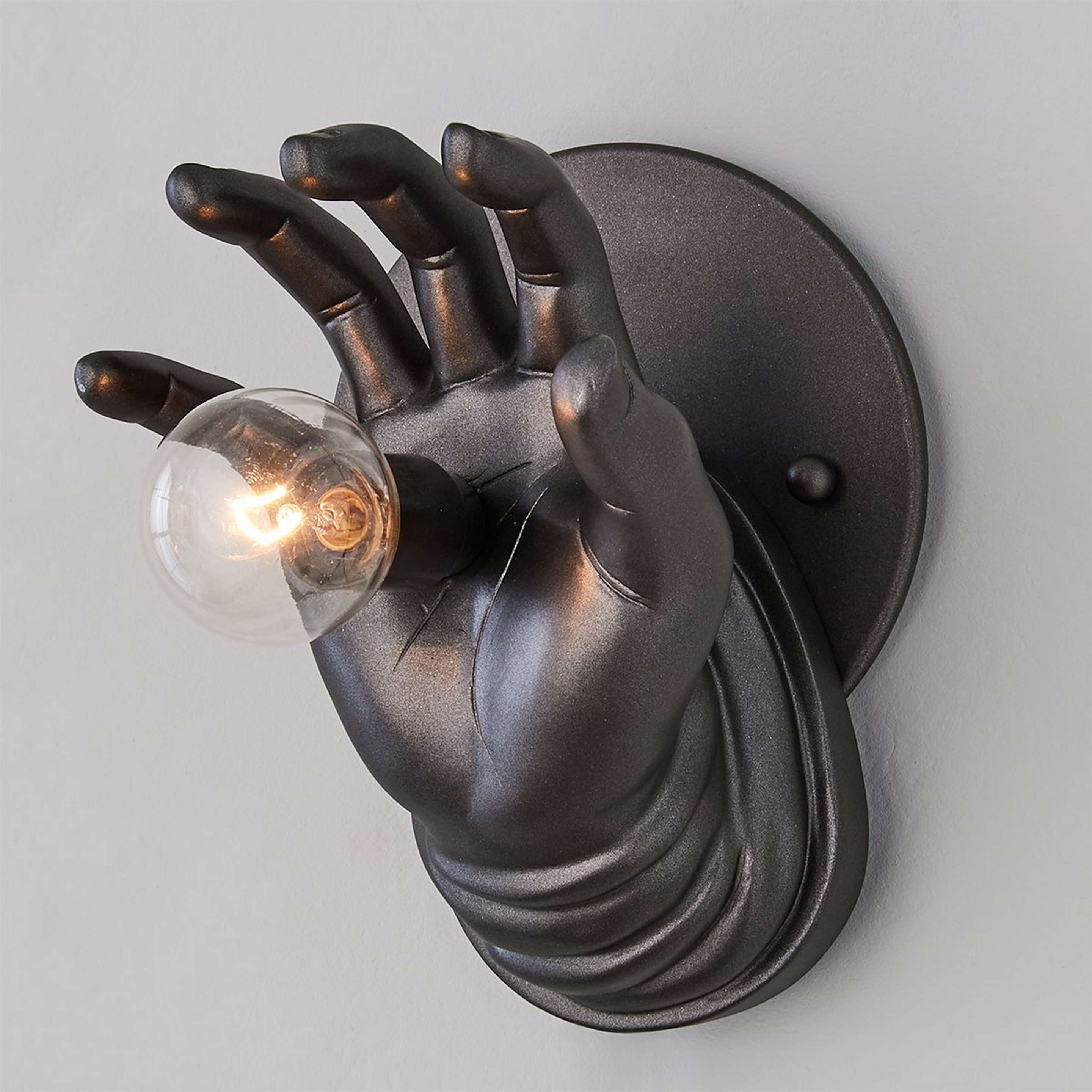 A Need a Hand Sconce with Bronze color