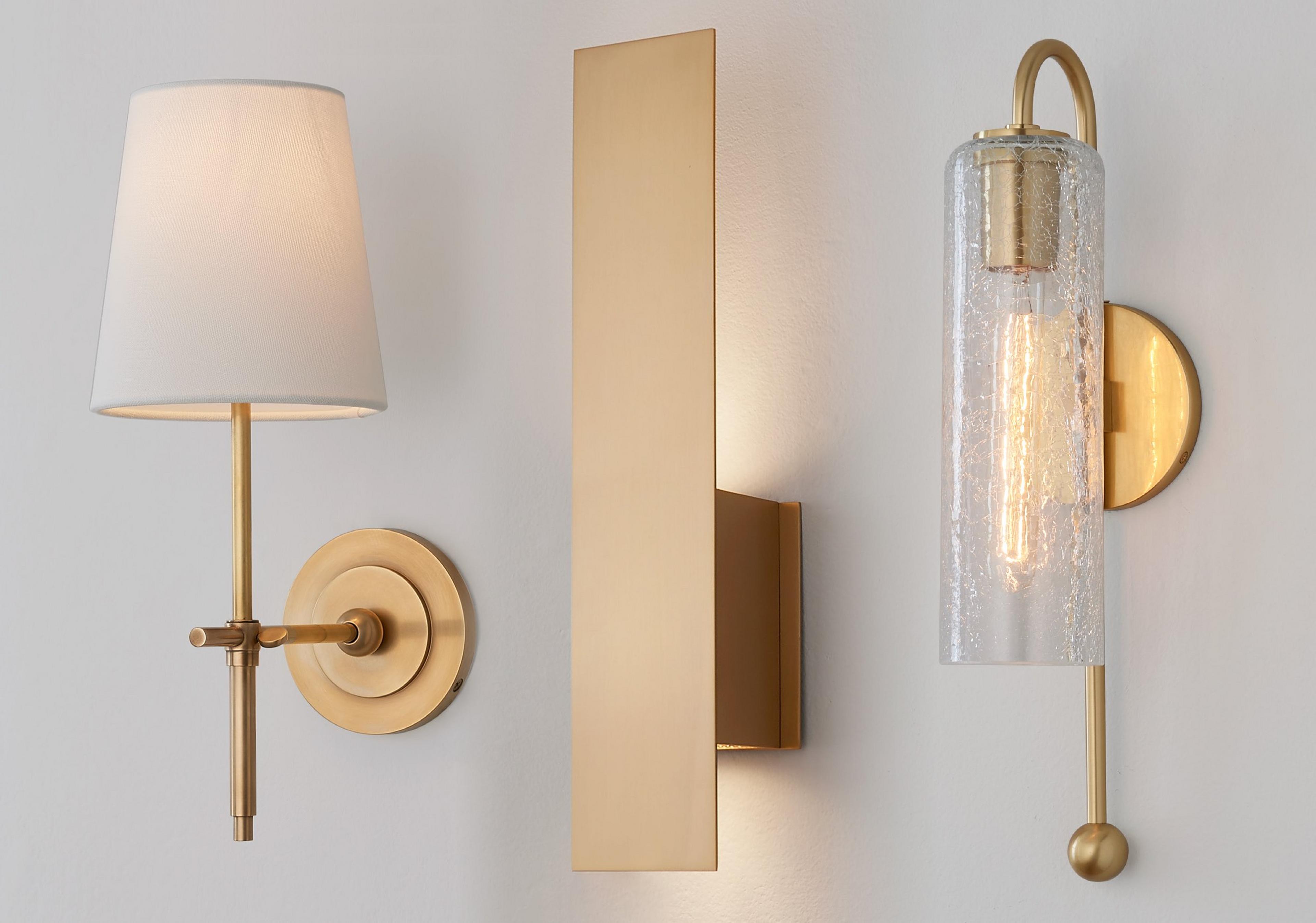 Collection of sconces on a gray wall