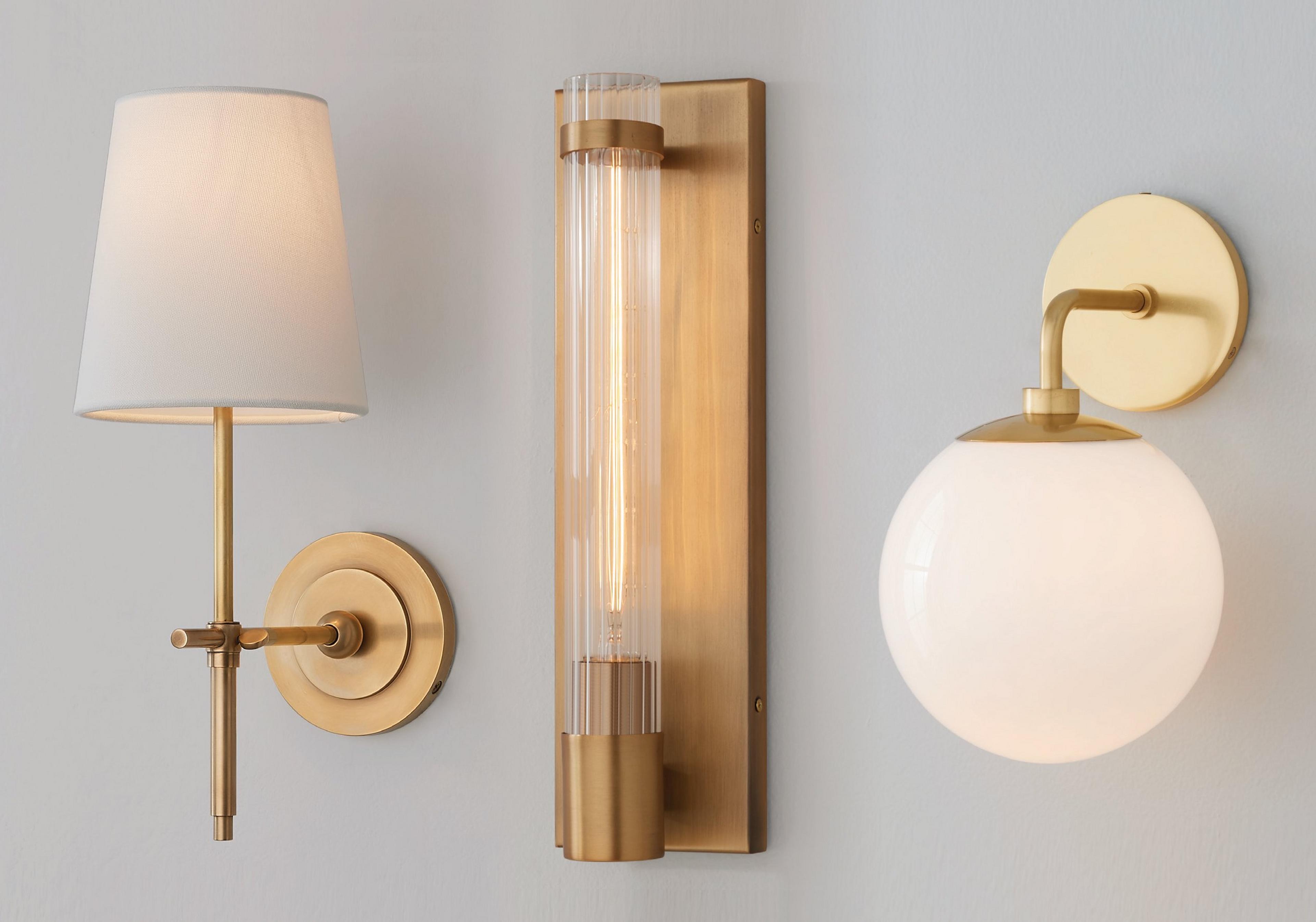 Collection of sconces on a gray wall