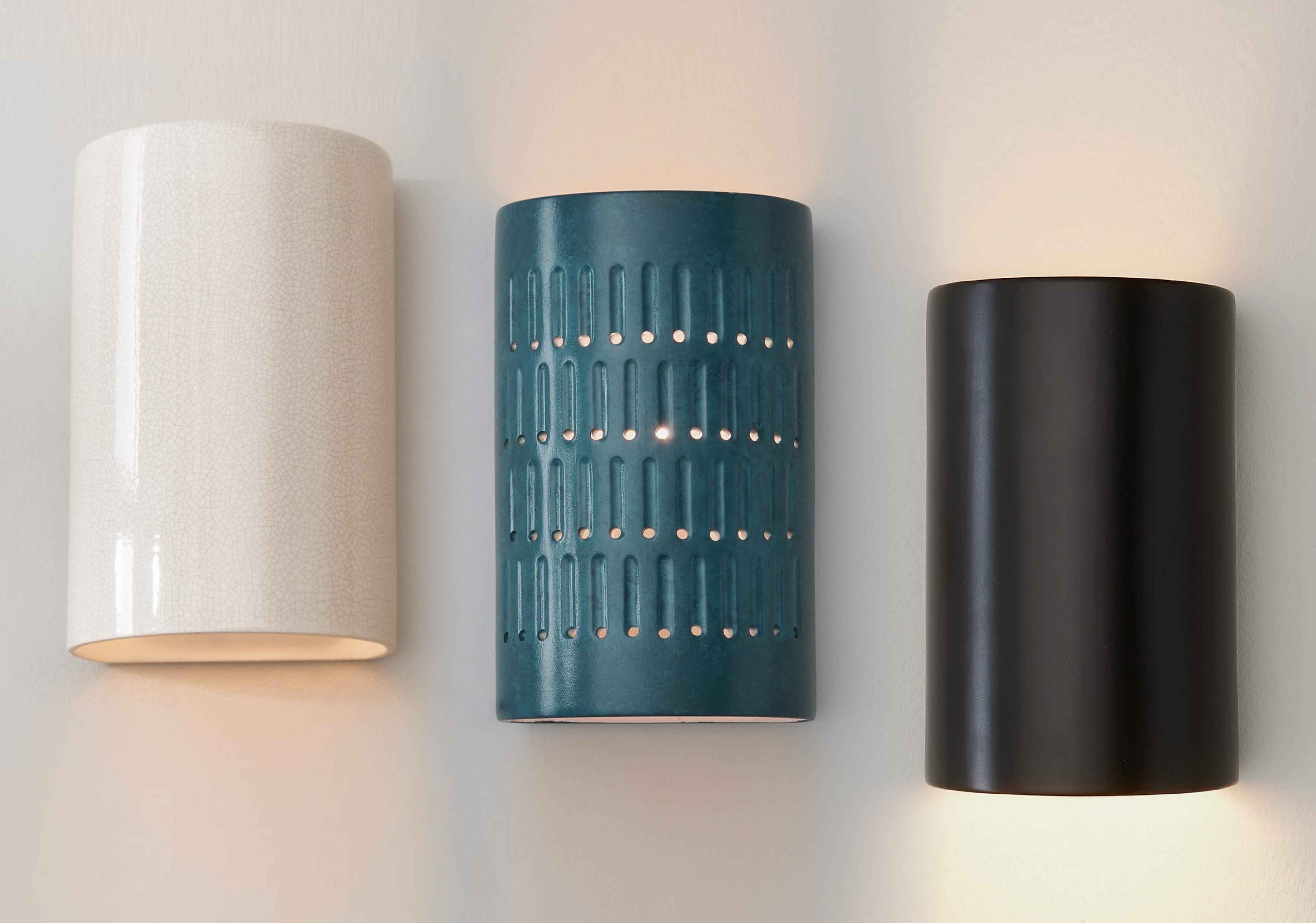 Ceramic sconces on a gray wall