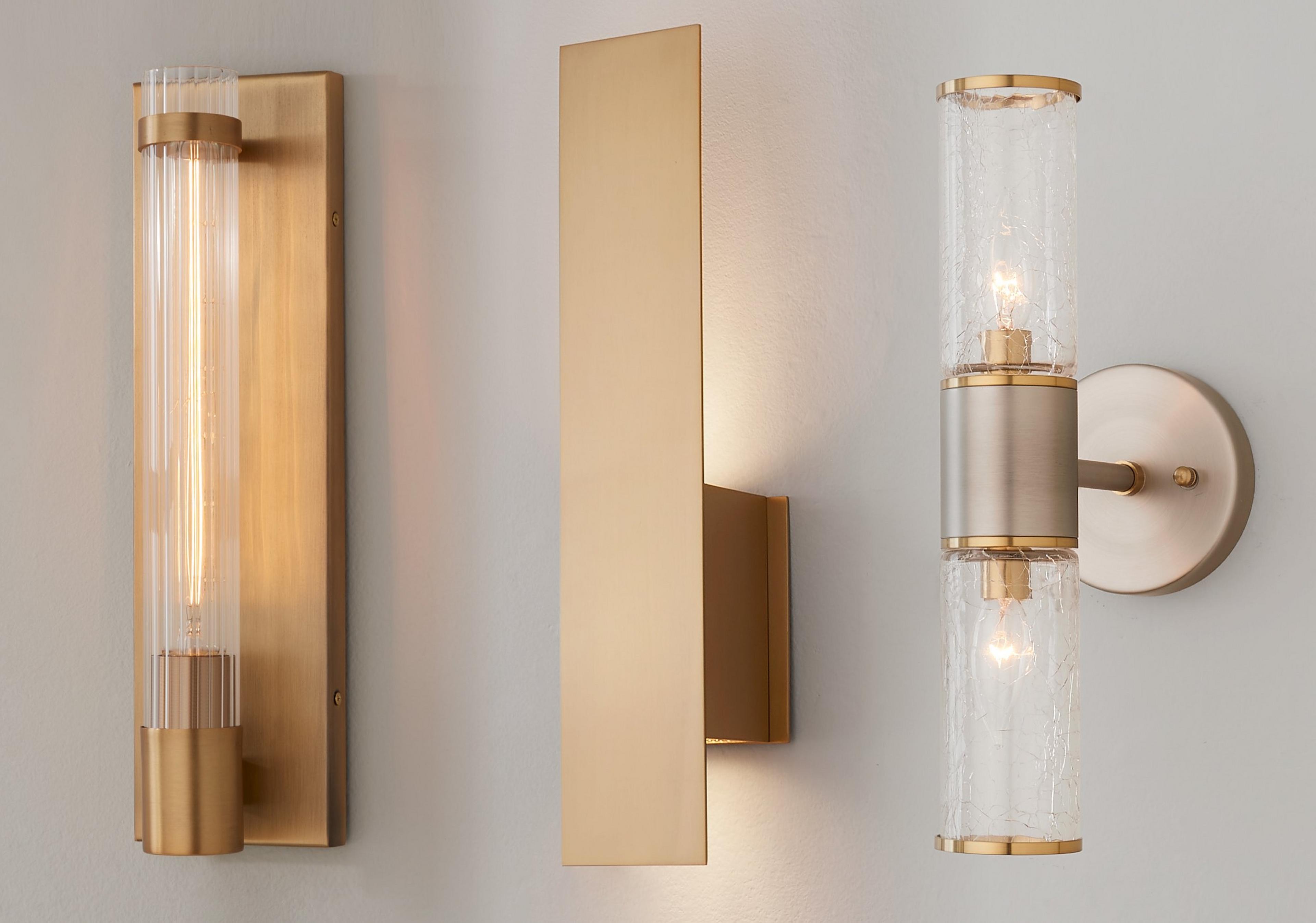 Collection of sconces on a gray wall