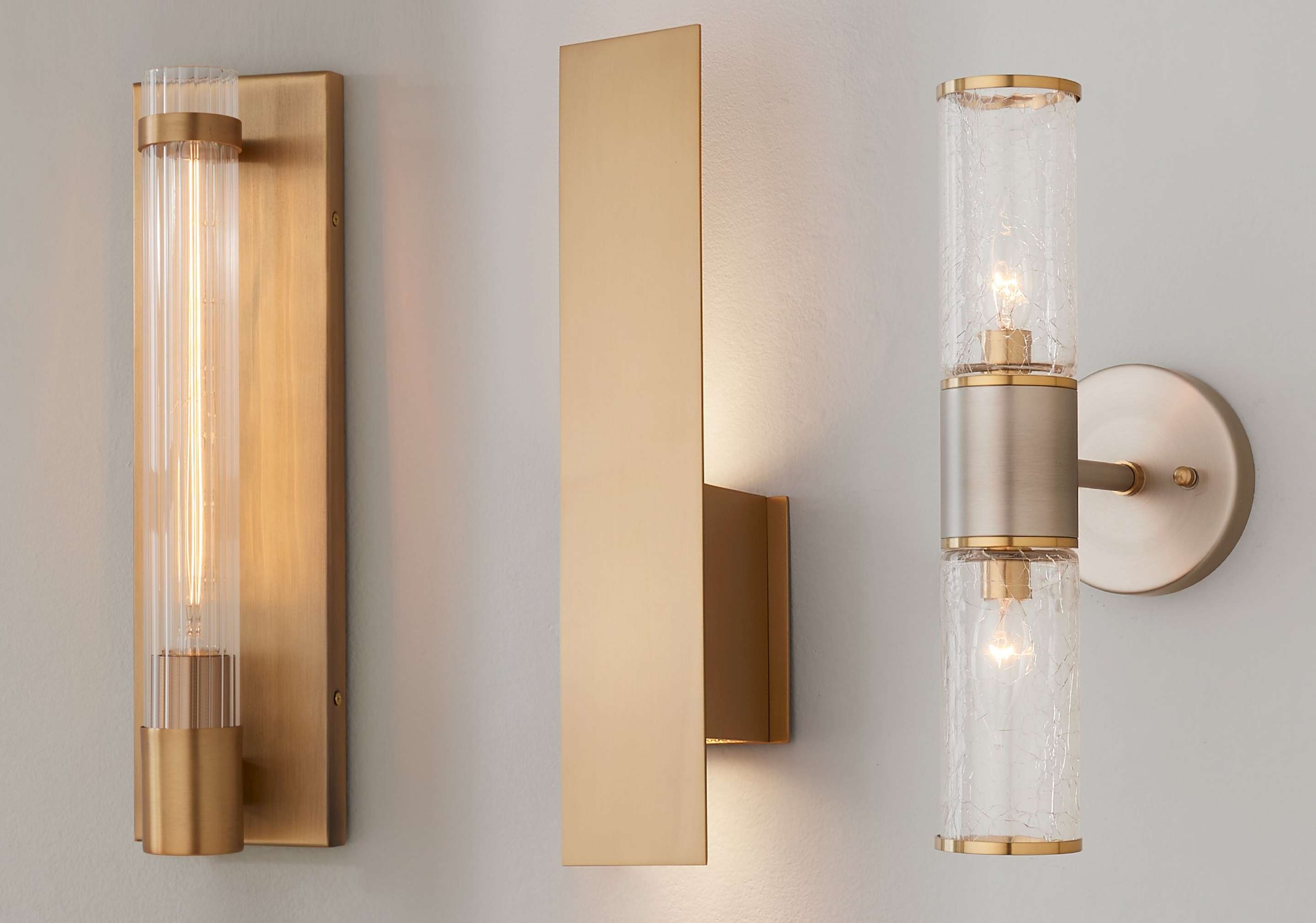 Collection of sconces on a gray wall 