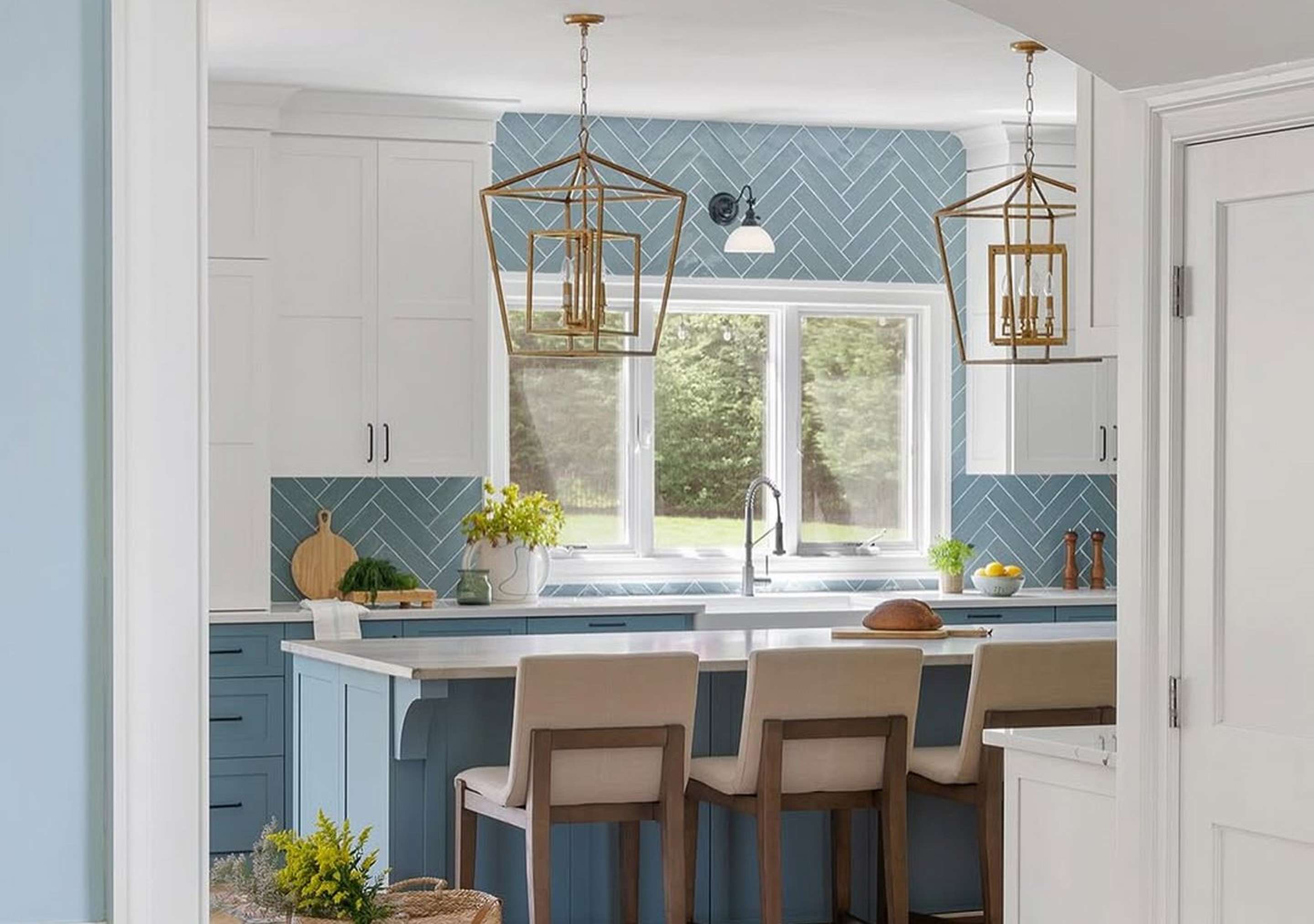 Kitchen with blue walls and two oversized lanterns
