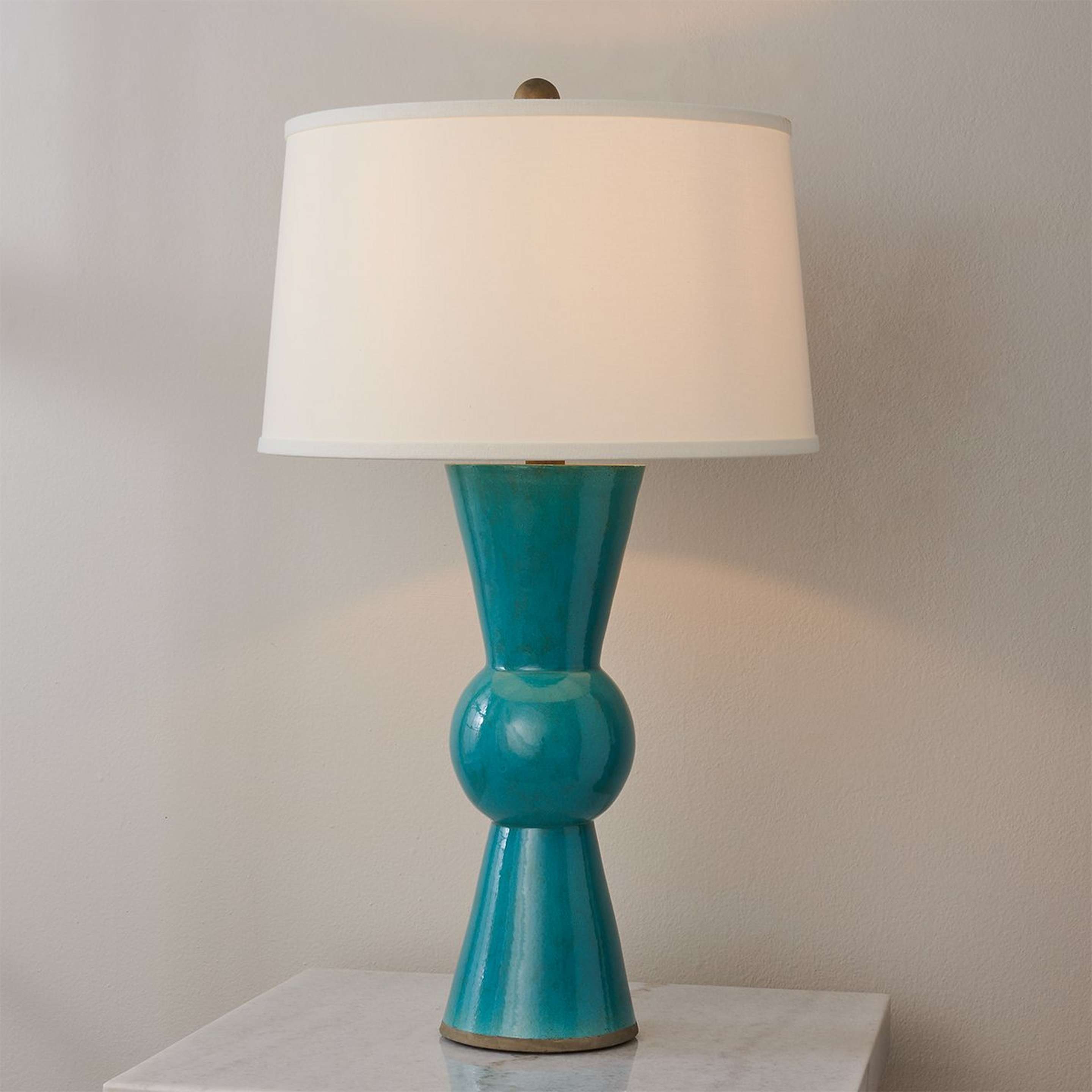 A Hourglass Ceramic Table Lamp with Teal color