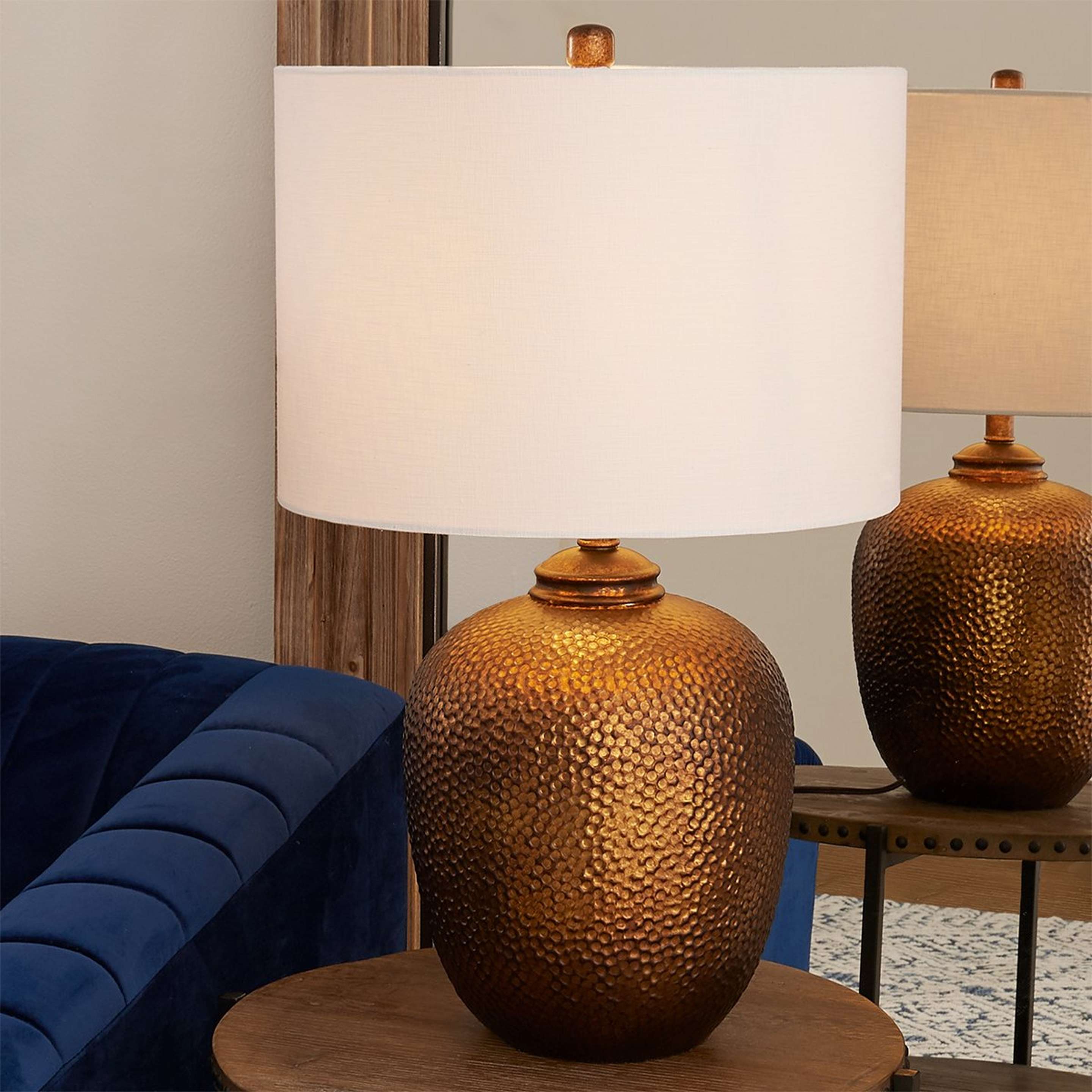 A Hammered Copper Table Lamp with Antique Copper color