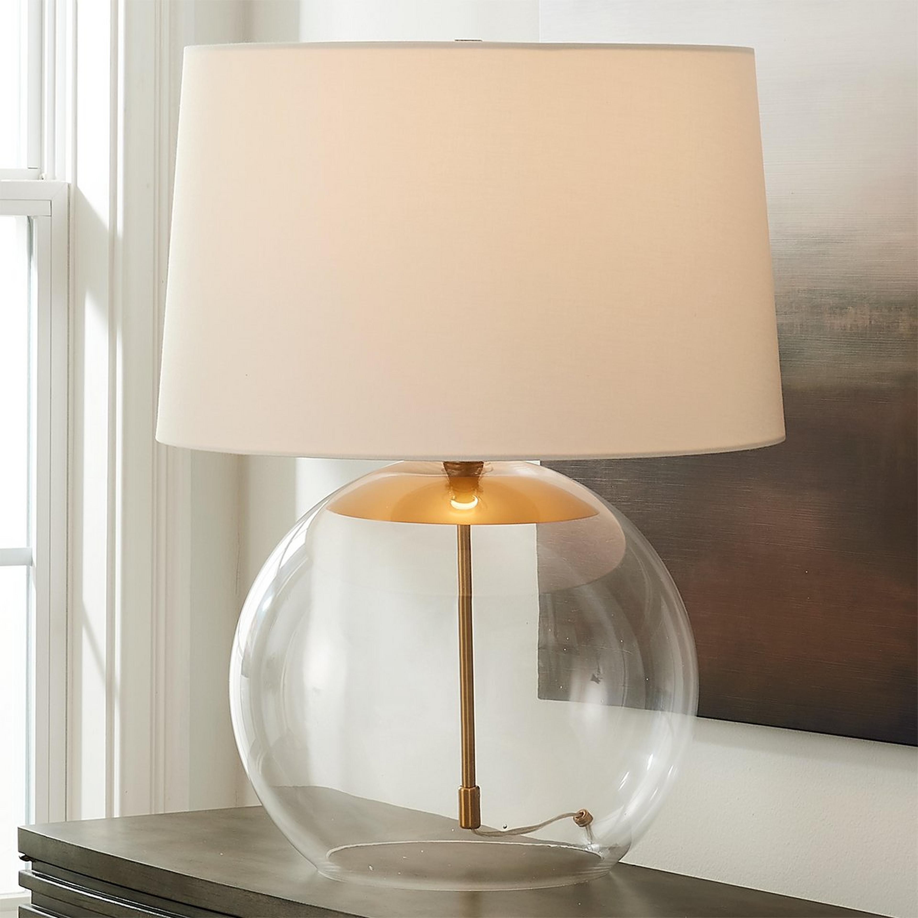 A Marlon Table Lamp with Clear Glass / Burnished Brass color