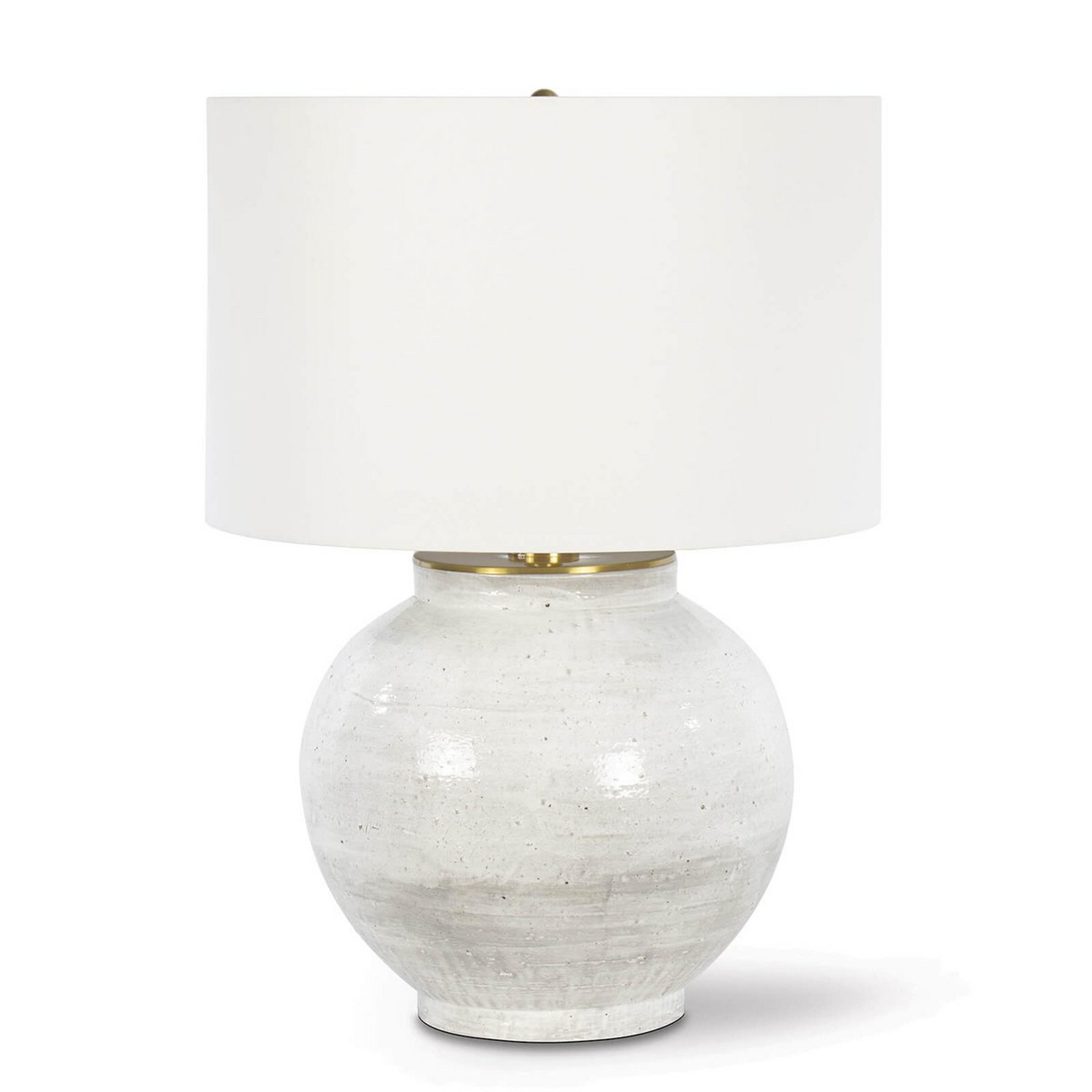 A Nyali Table Lamp with White / Soft Gray / Brass color