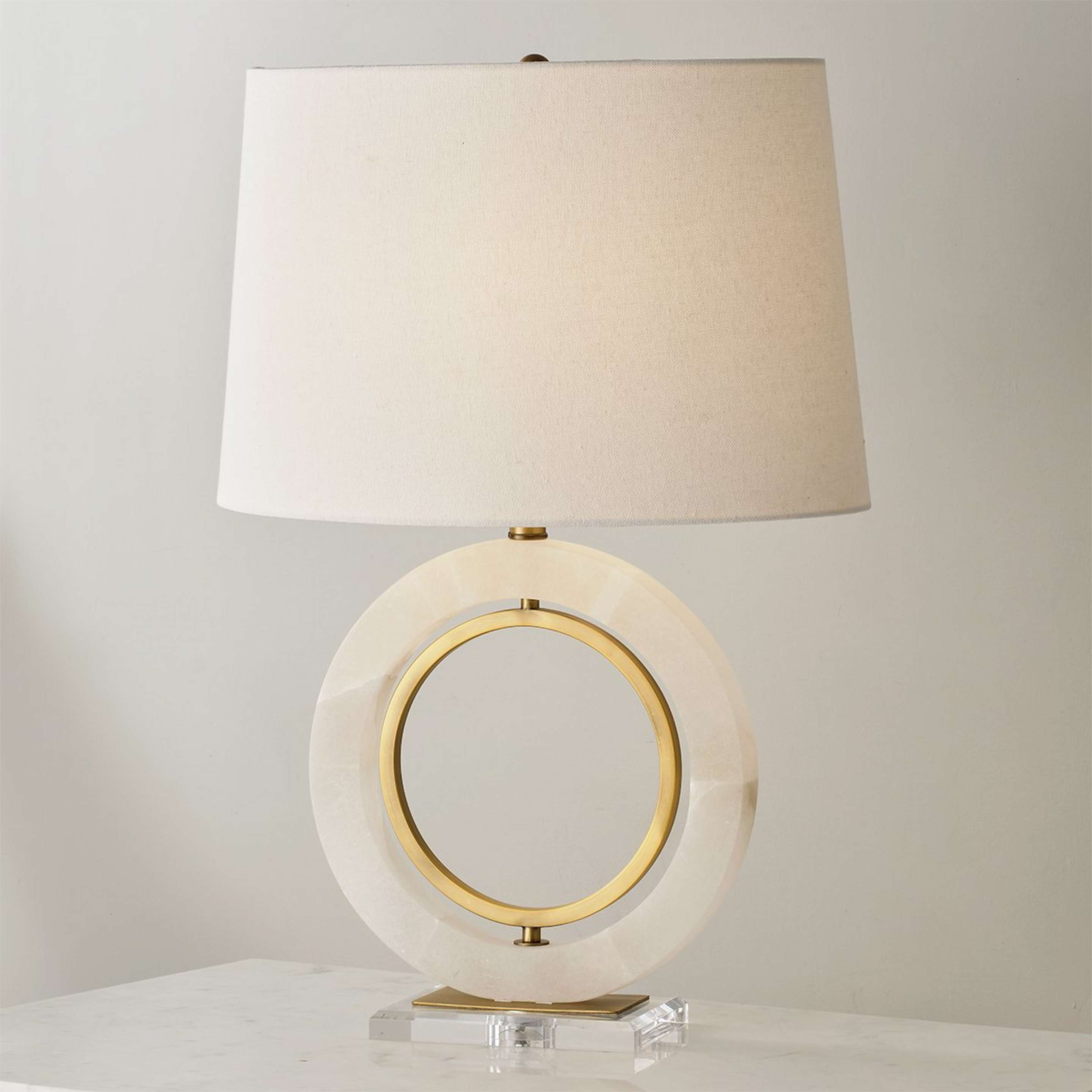 A Domingo Ring Table Lamp with Clear Acrylic / Alabaster / Antique Brass color