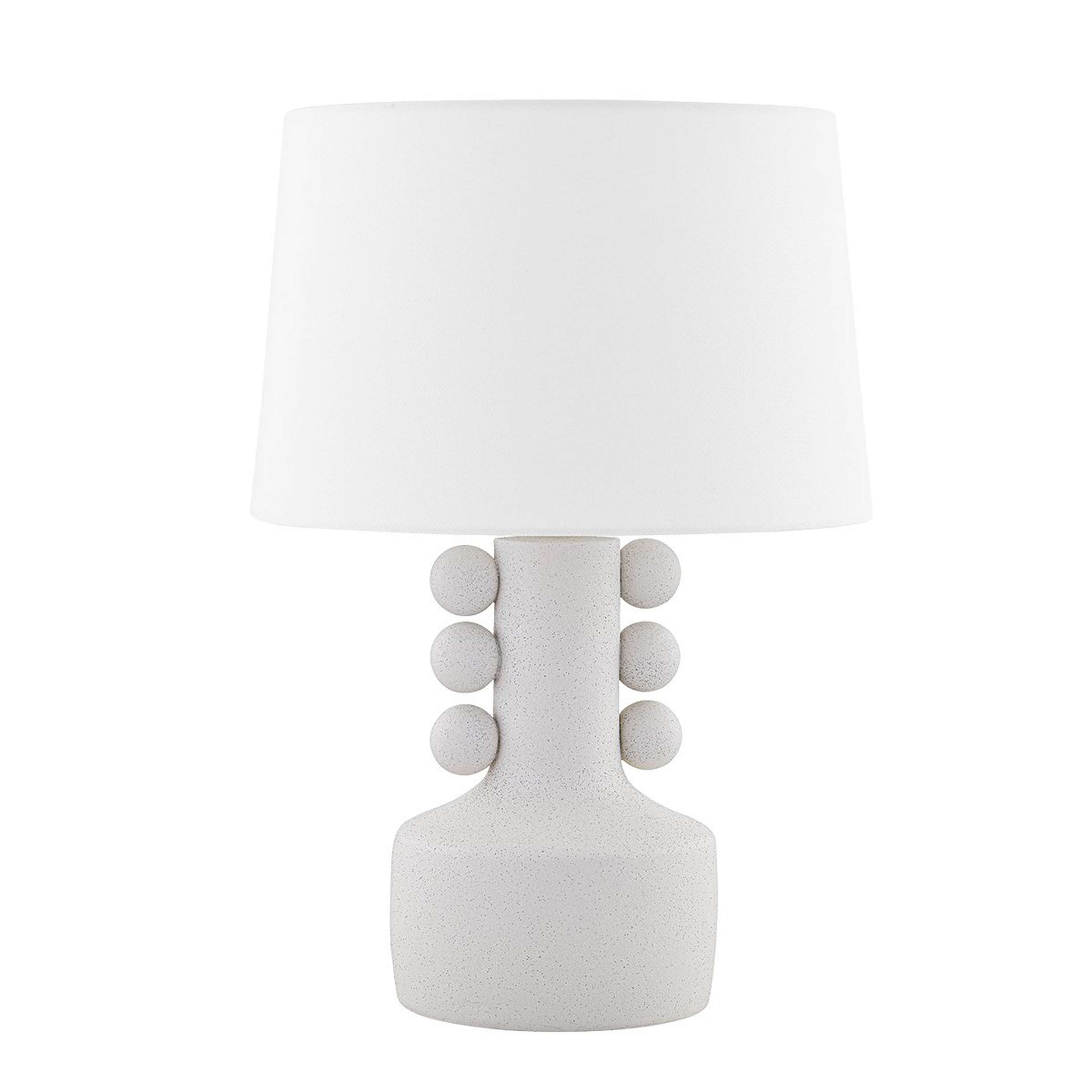 A Faraji Table Lamp with Textured White Ceramic color