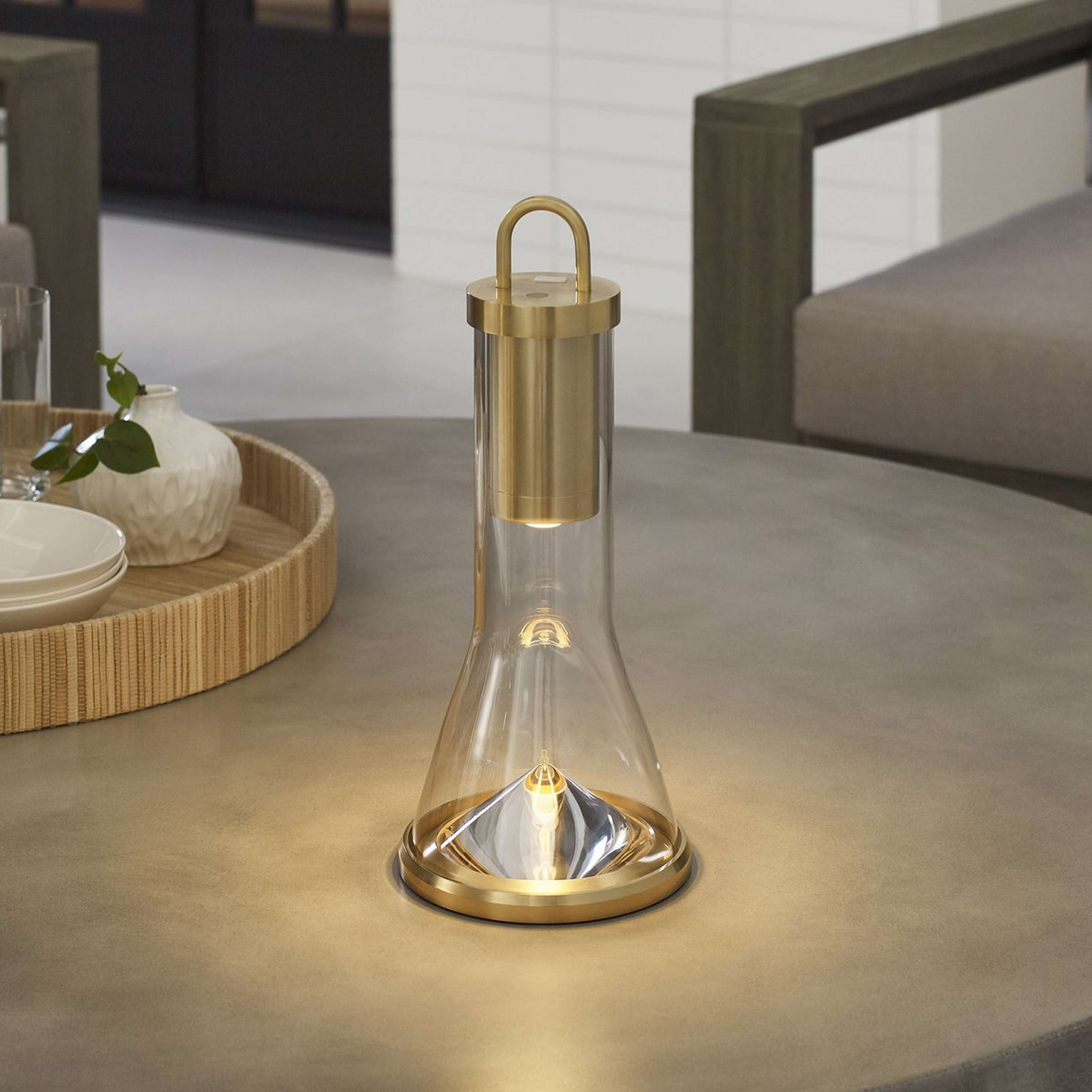 A Vervain Cordless LED Indoor/Outdoor Table Lamp with Natural Brass / Clear Glass color