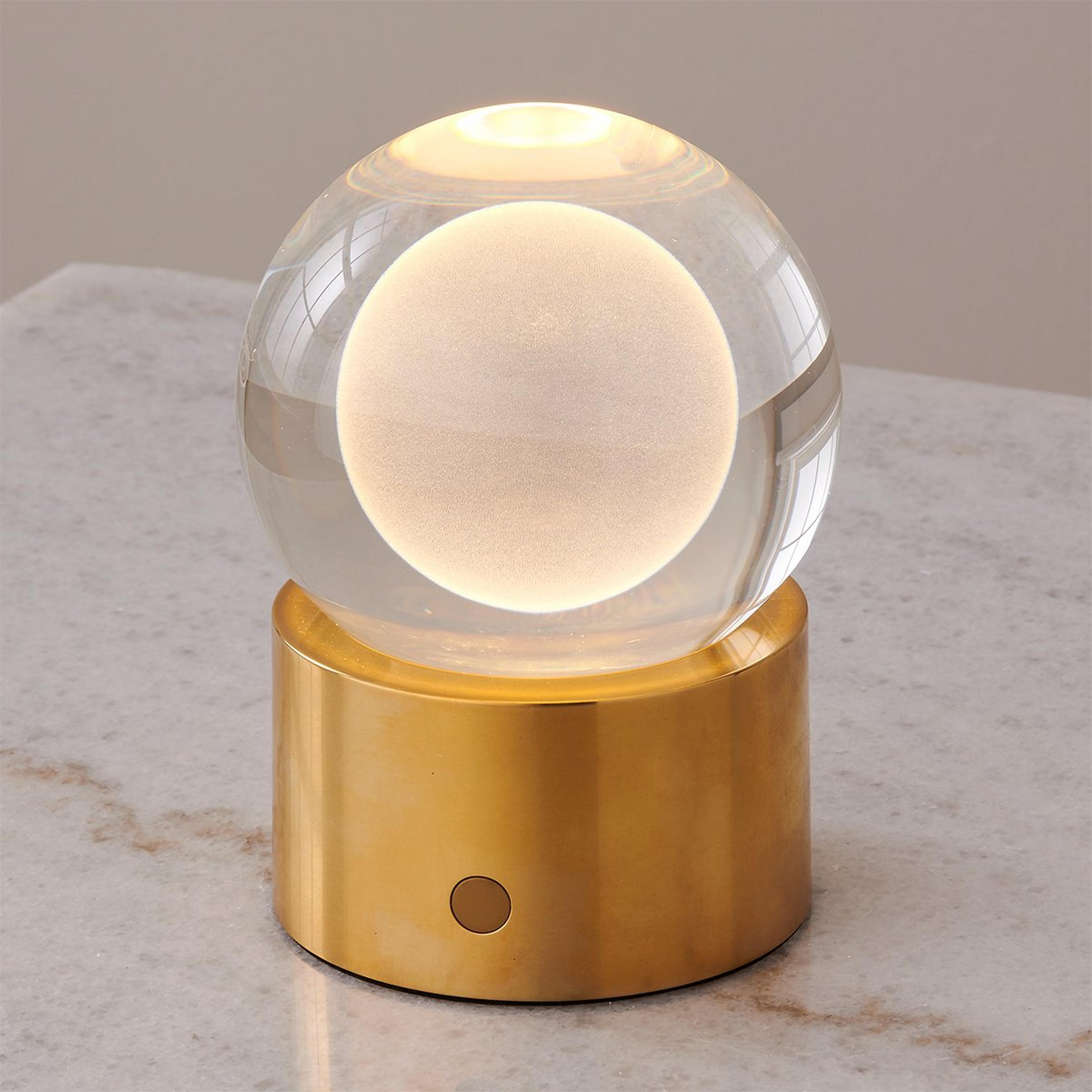 A Moonstone Cordless LED Indoor/Outdoor Table Lamp with Natural Brass / Laser-Etched Glass color
