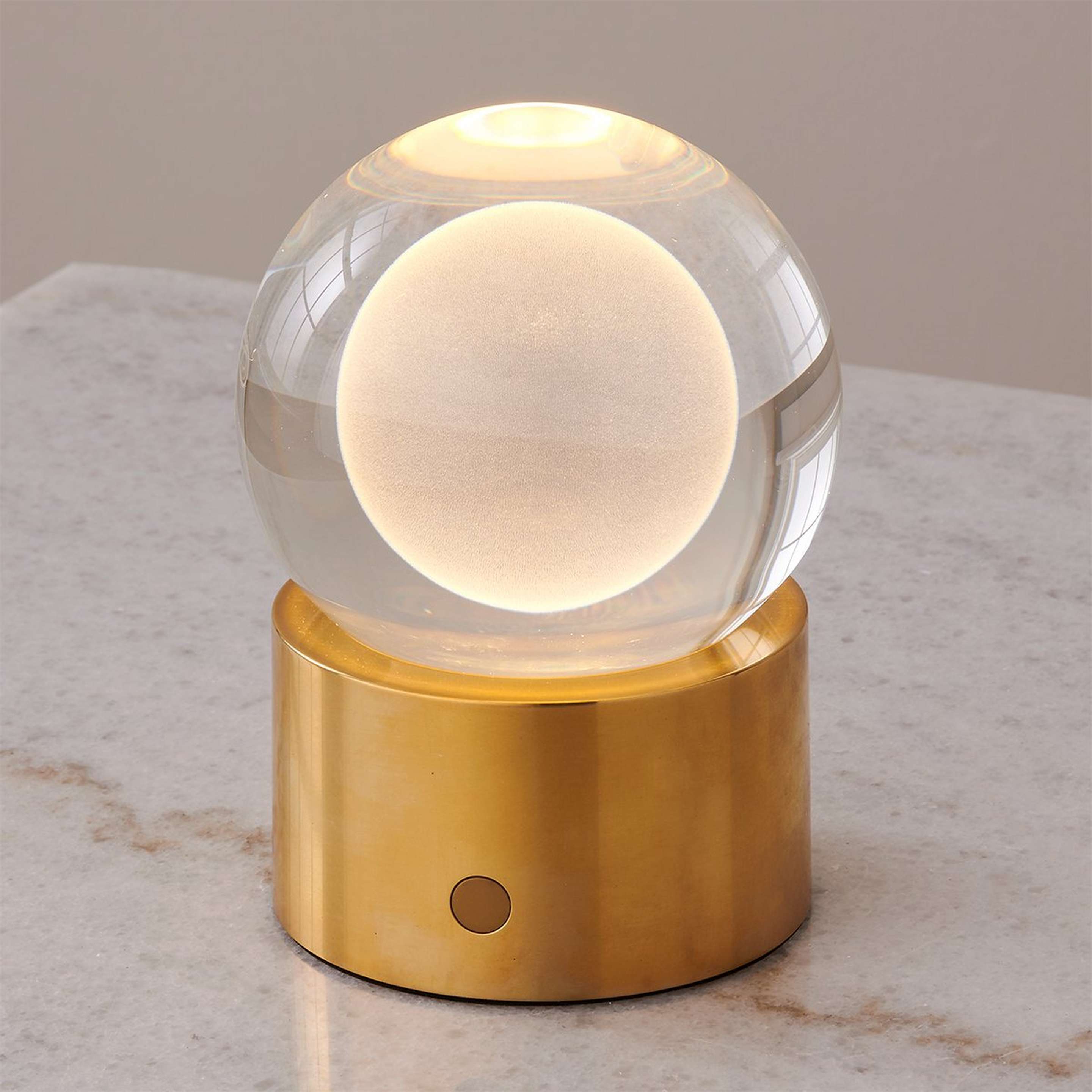 A Moonstone Cordless LED Indoor/Outdoor Table Lamp with Natural Brass / Laser-Etched Glass color