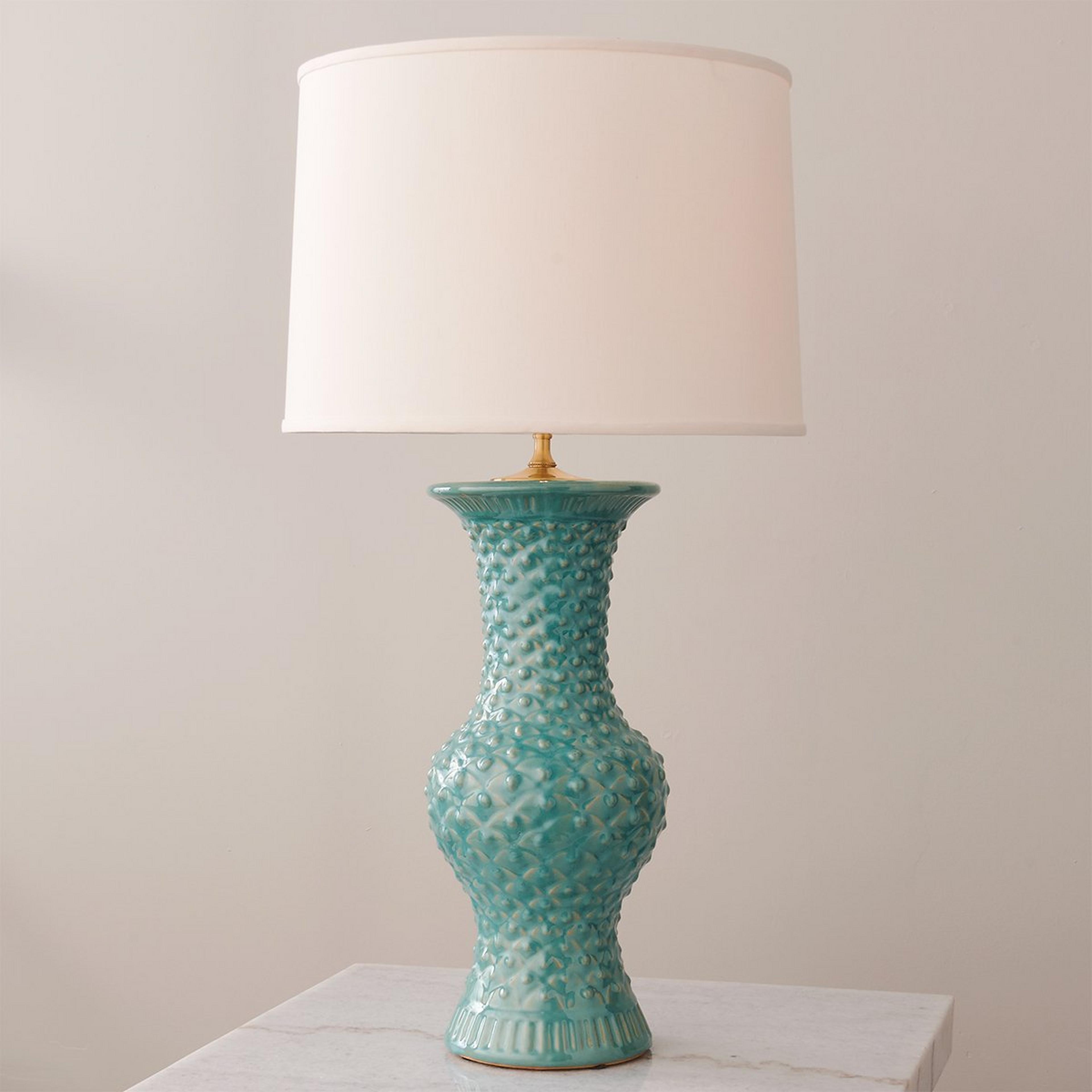 A Vescali Table Lamp with Aqua / White color