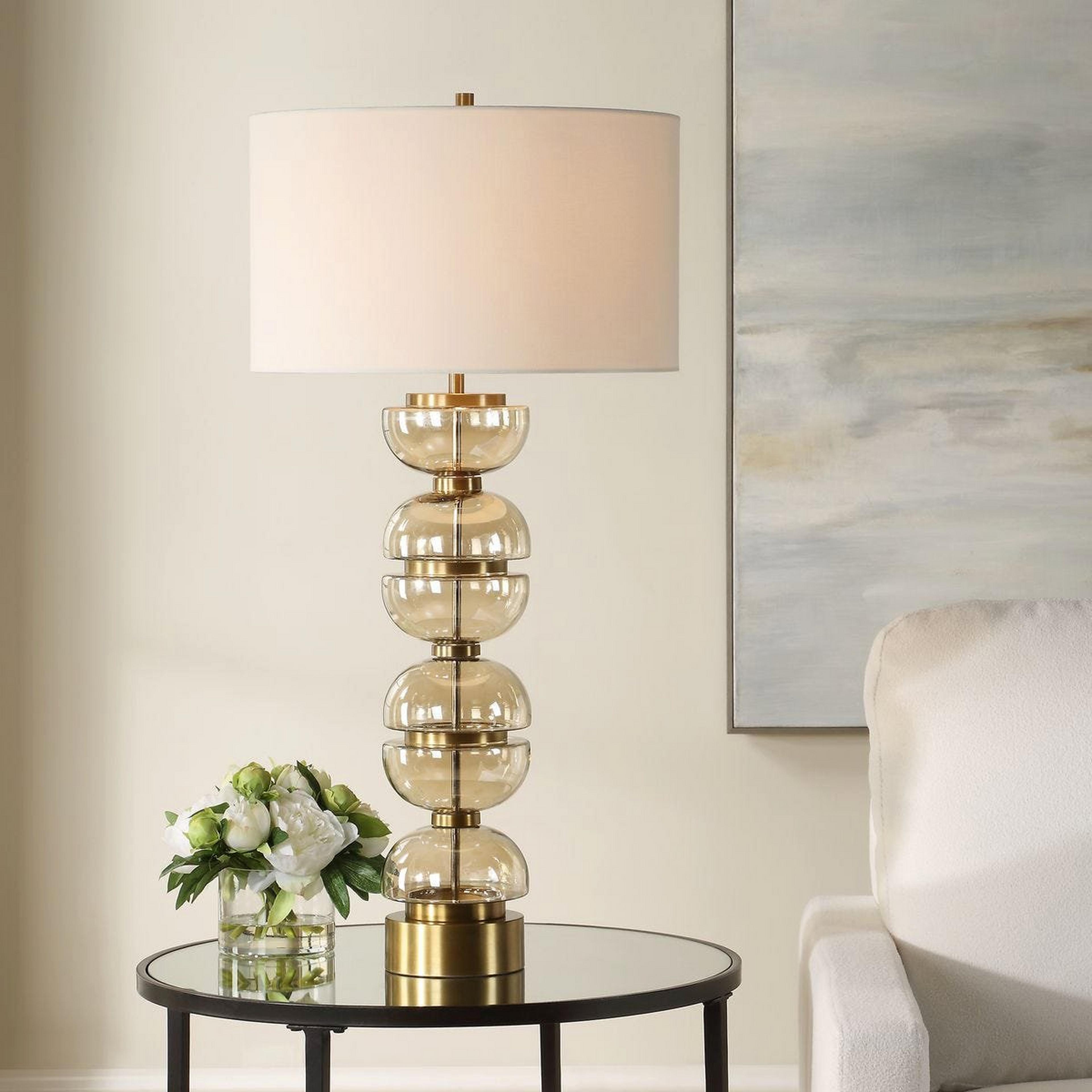 A Fortuna Table Lamp with Gold / Amber Glass color