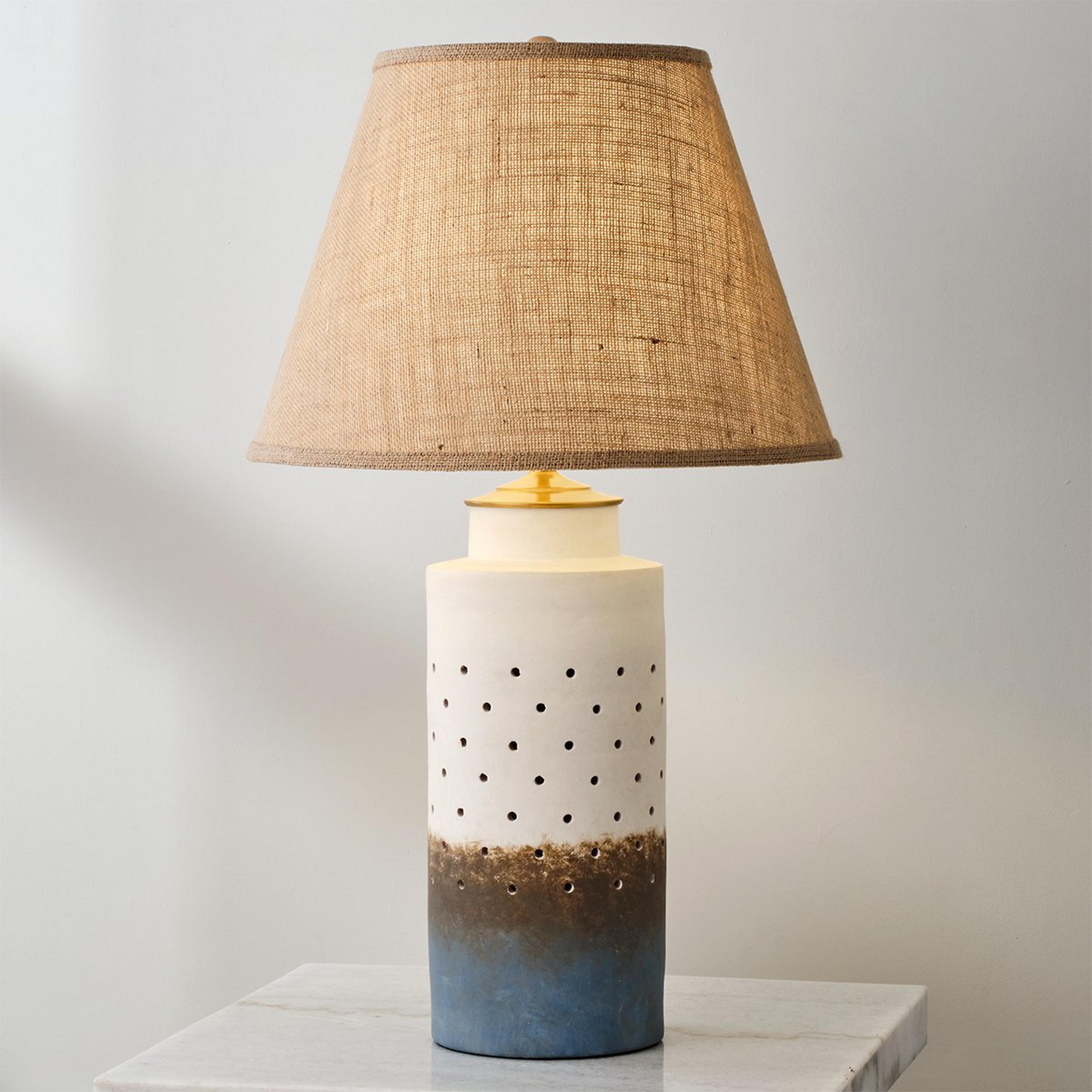 A Mesa Glow Table Lamp with Blue / White / Brass color