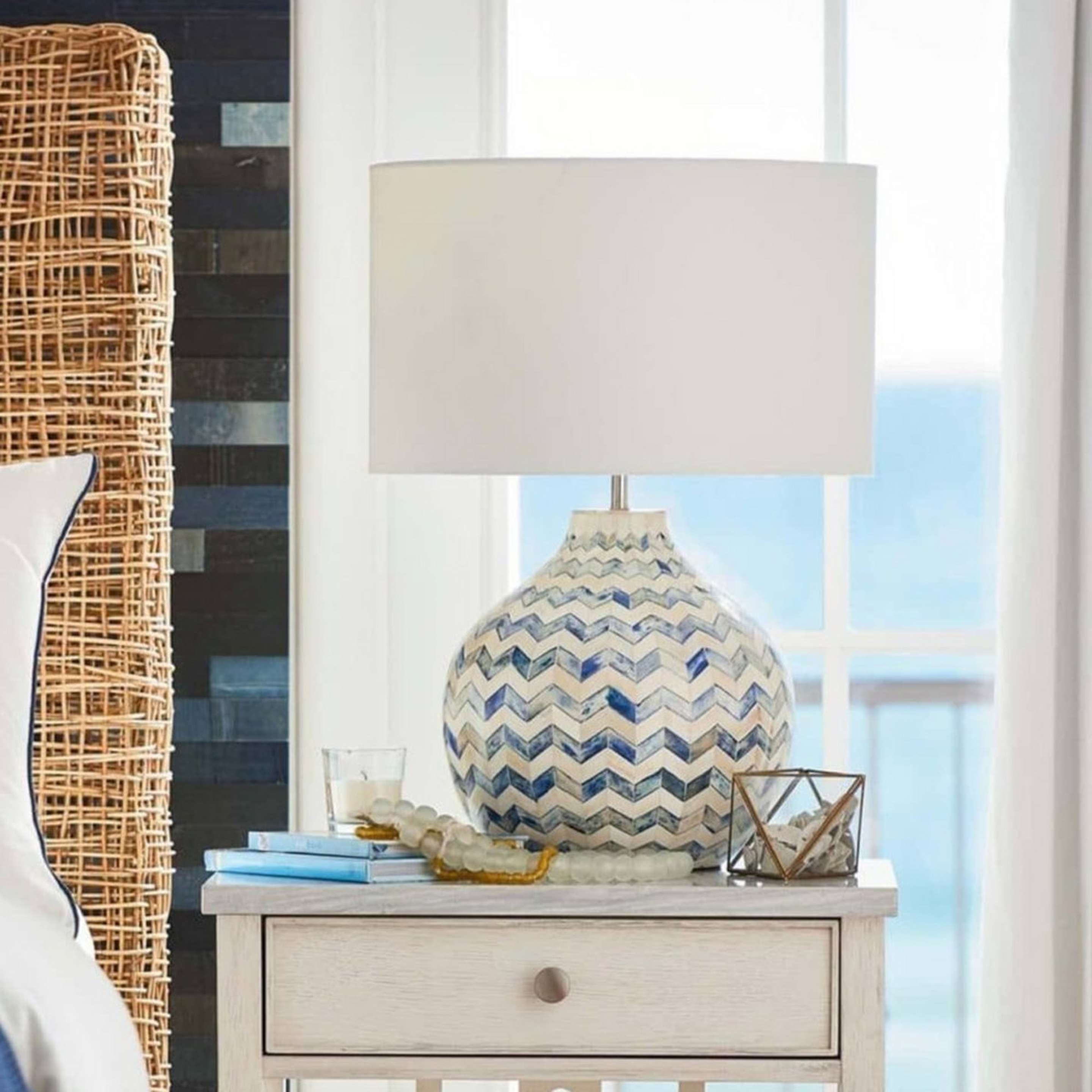 A Briarcliff Table Lamp with Brass / Blue / Natural Bone / White color