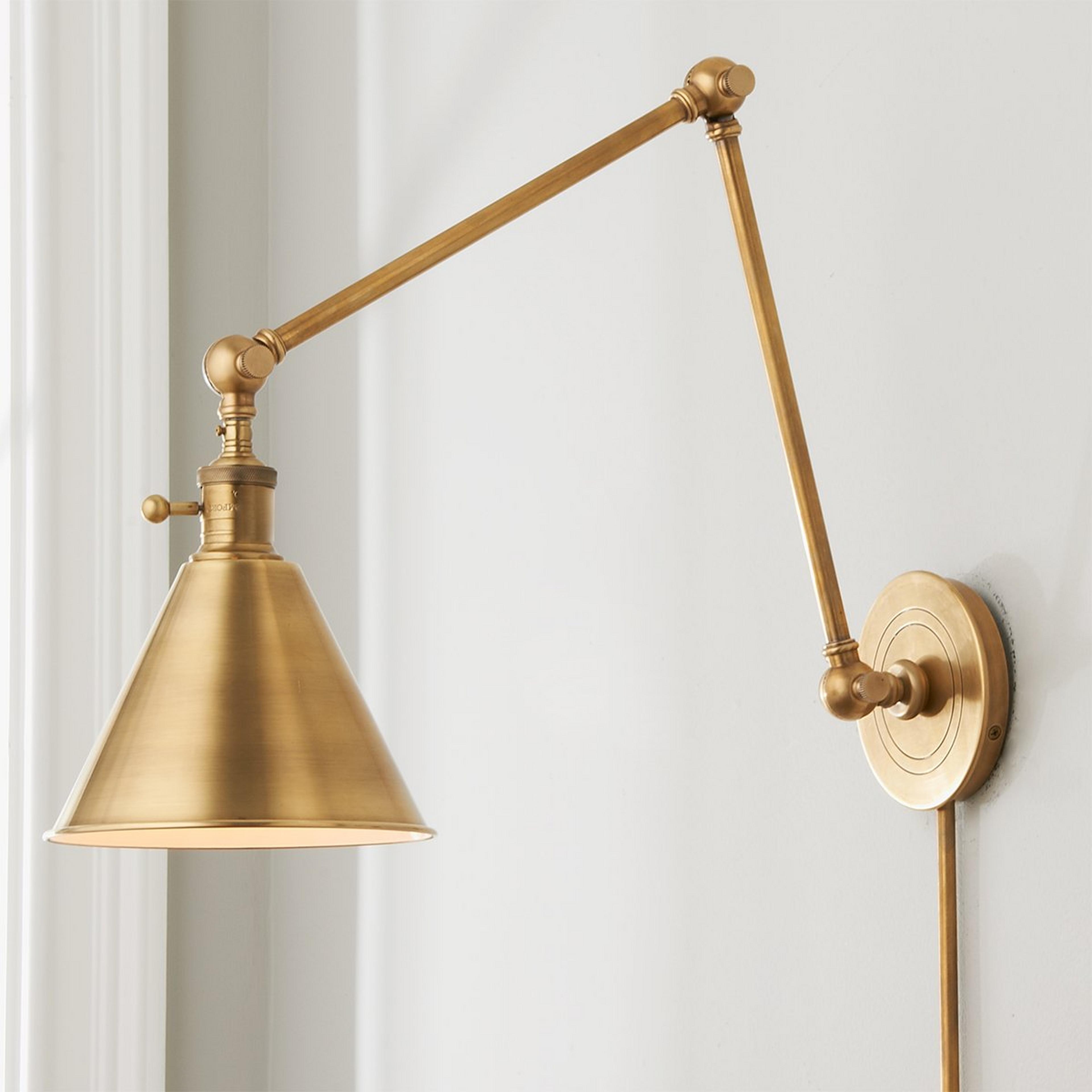 A Cone Pivot Shade Double Joint Swing Arm with Olde Brass color