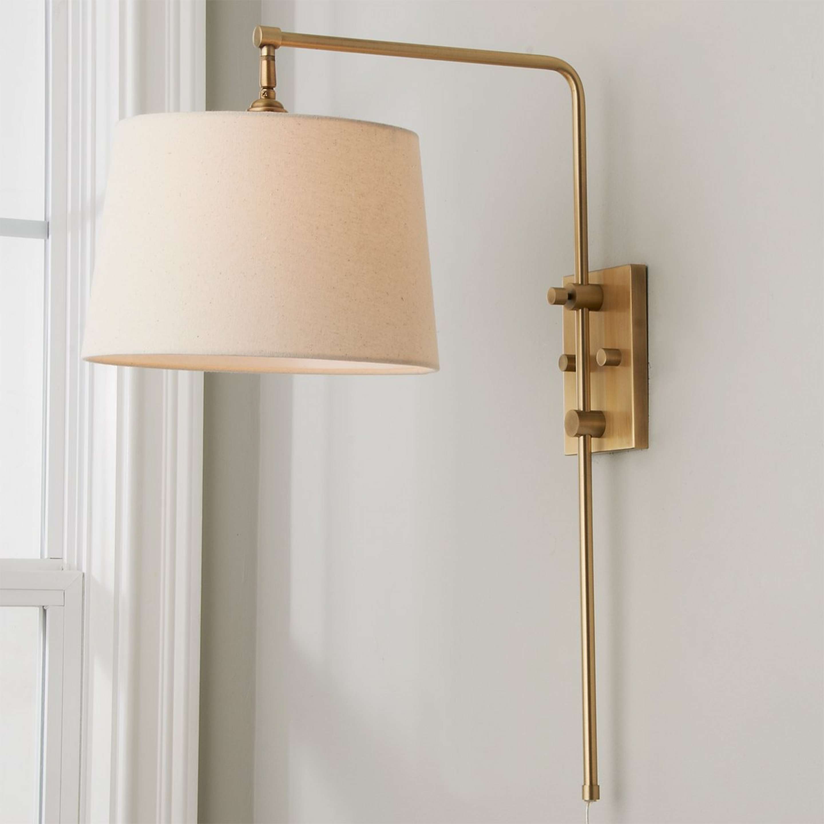 A Down-Bridge Shade Swing Arm with Antique Brass color