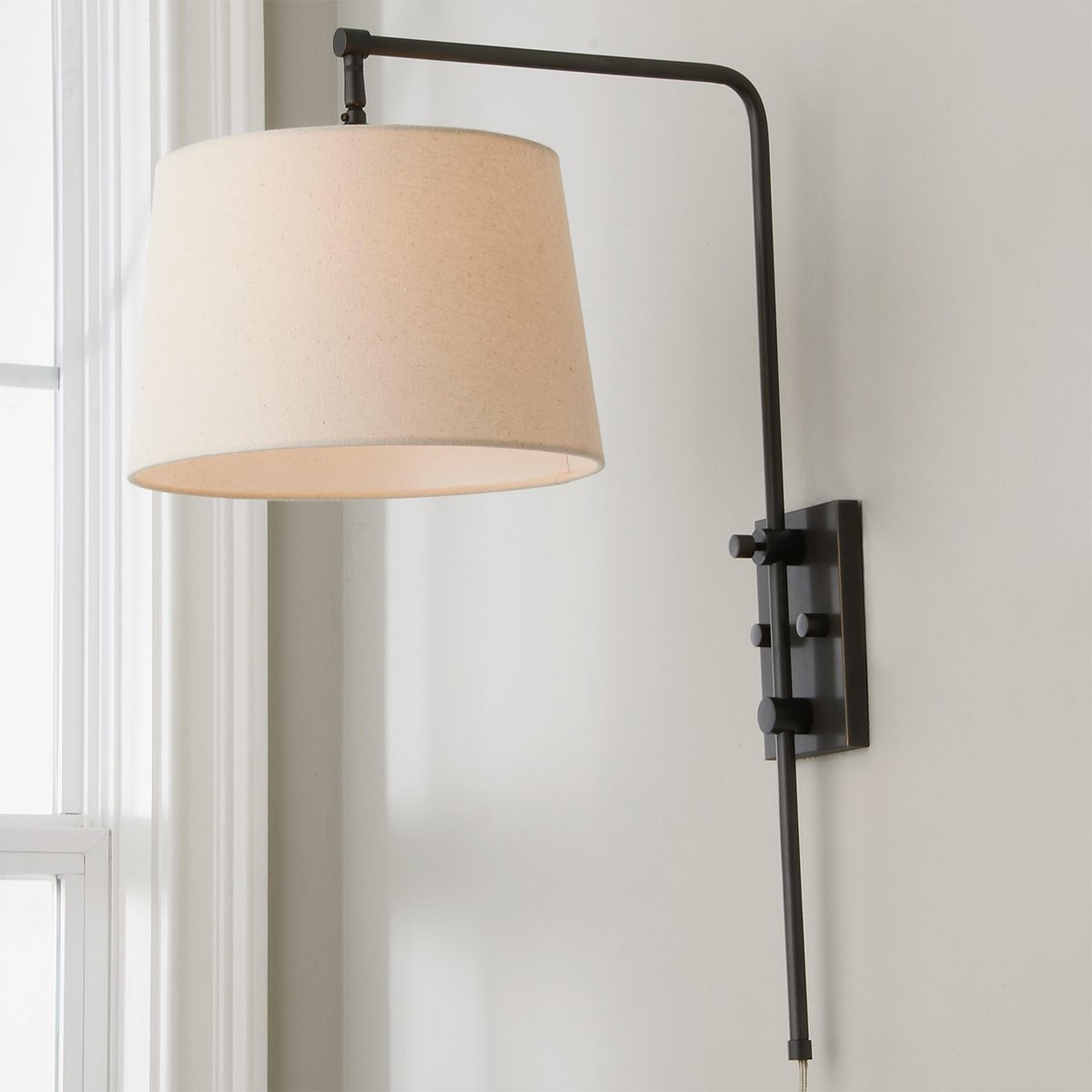A Down-Bridge Shade Swing Arm with Oil Rubbed Bronze color