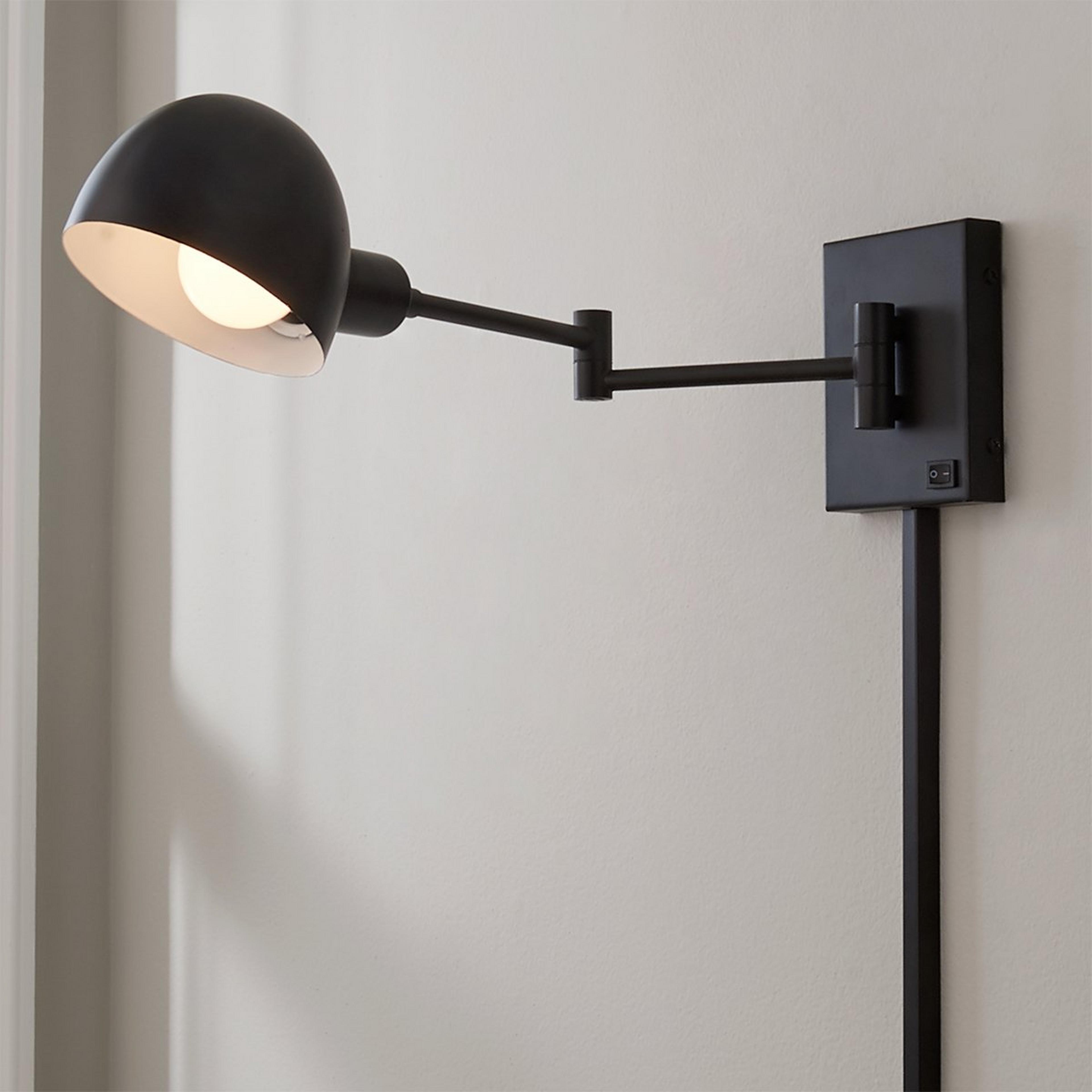 A Rounded Contemporary Swing Arm with Antique Bronze color