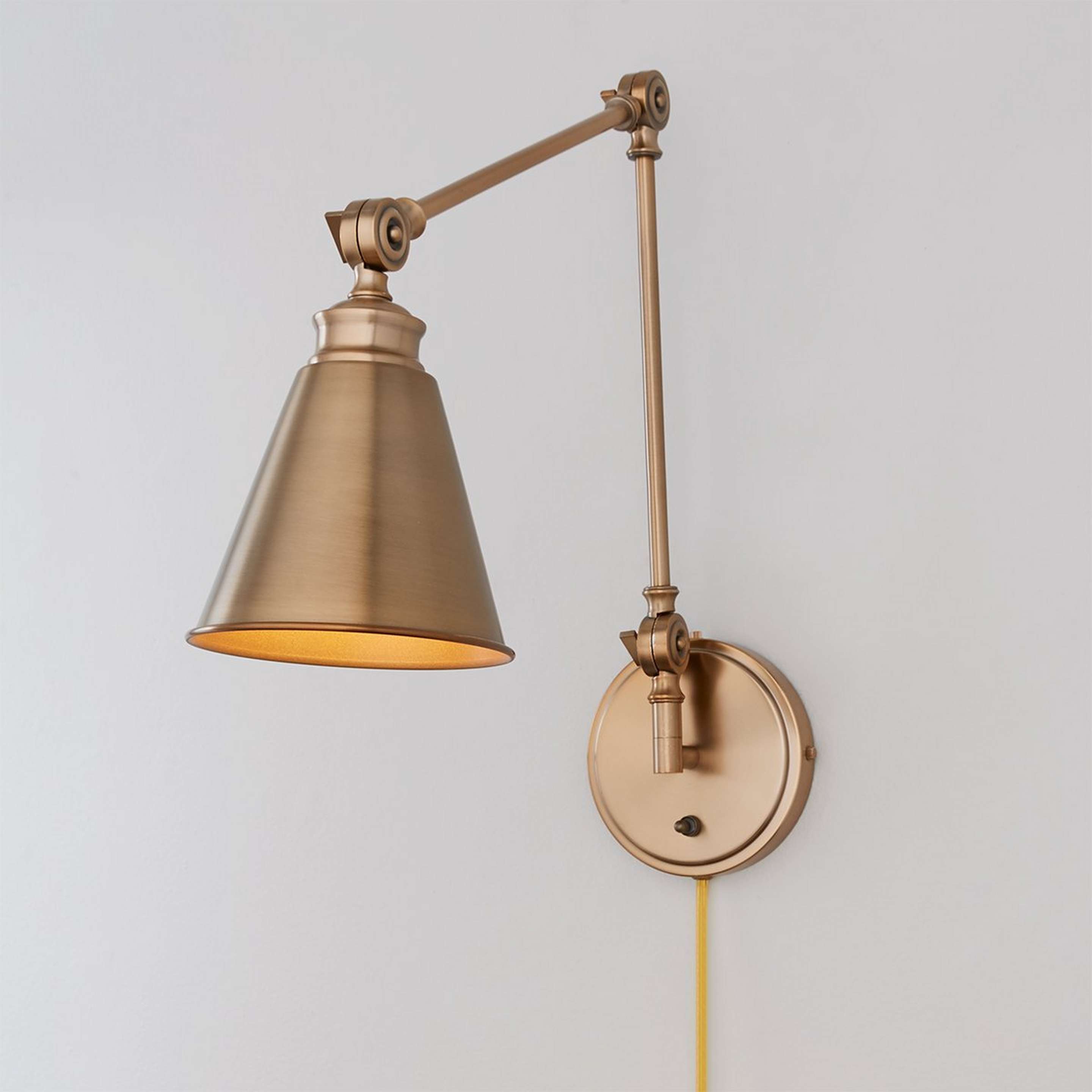 A Adjustable Arm Cone Swing Arm with Warm Brass color