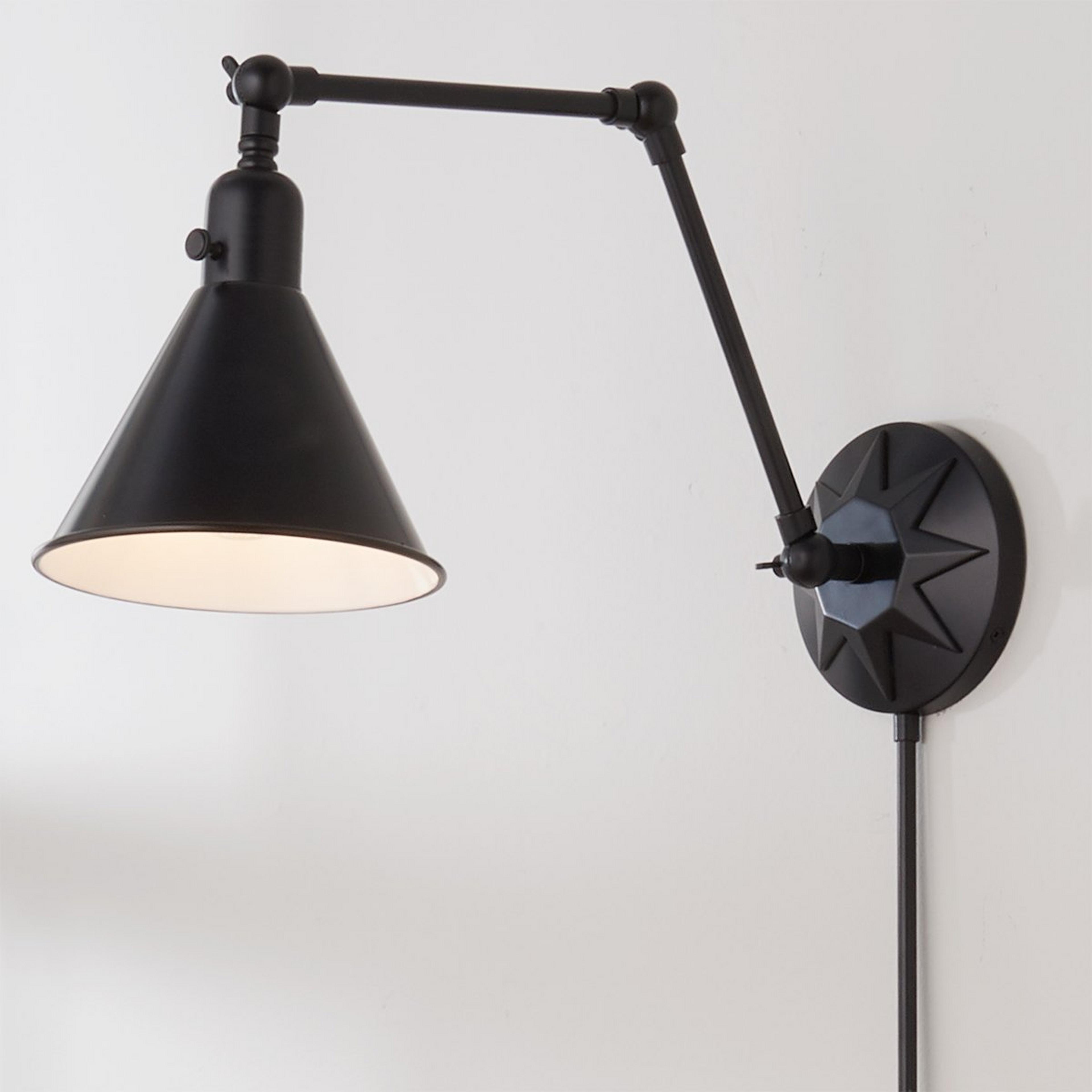A Sunburst Swing Arm with Matte Black color